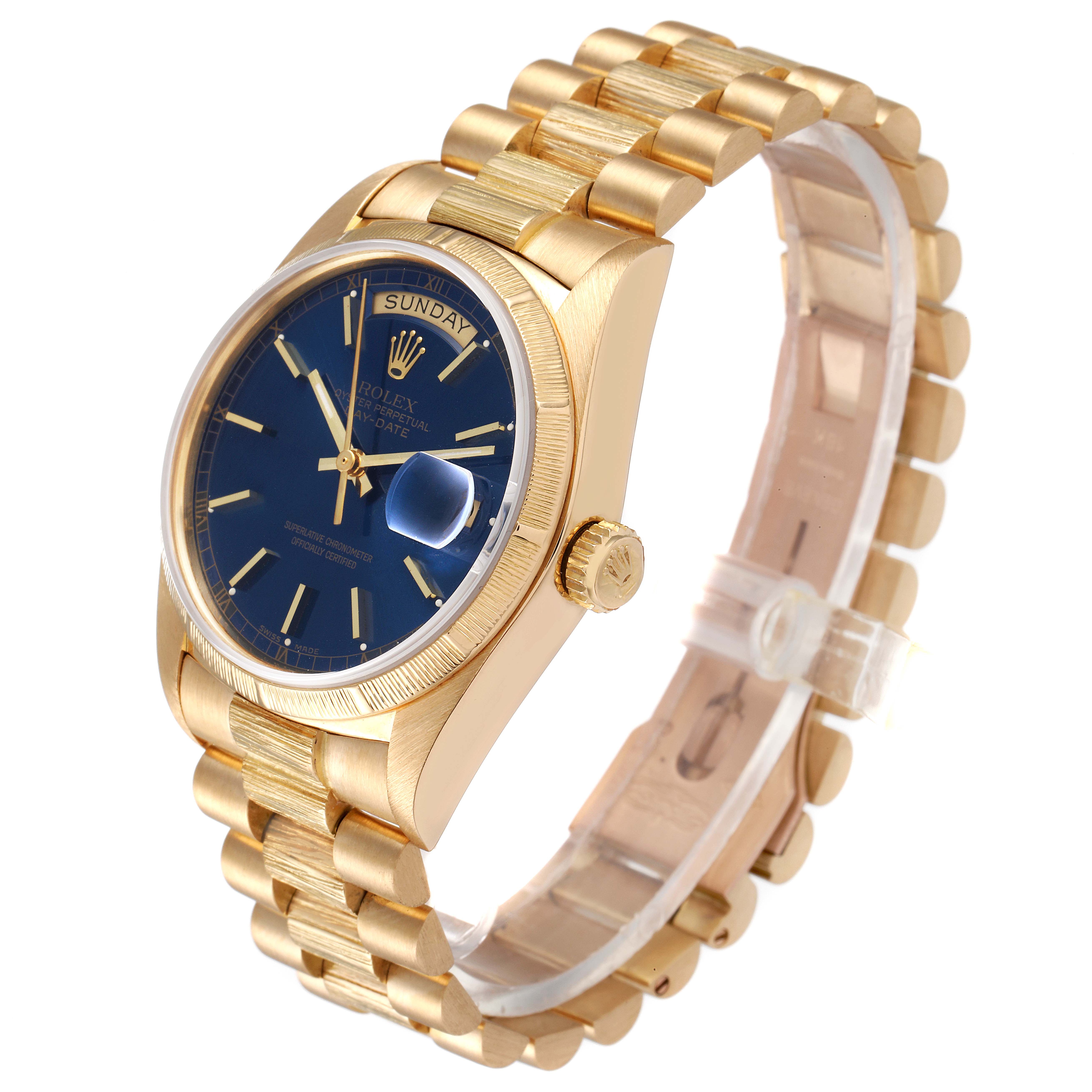 The Rolex President 18078 Men's Yellow Gold Blue Dial 18078 Men's Yellow Gold Blue Dial model watch is shown from an angled side view, displaying its gold bracelet and blue dial.
