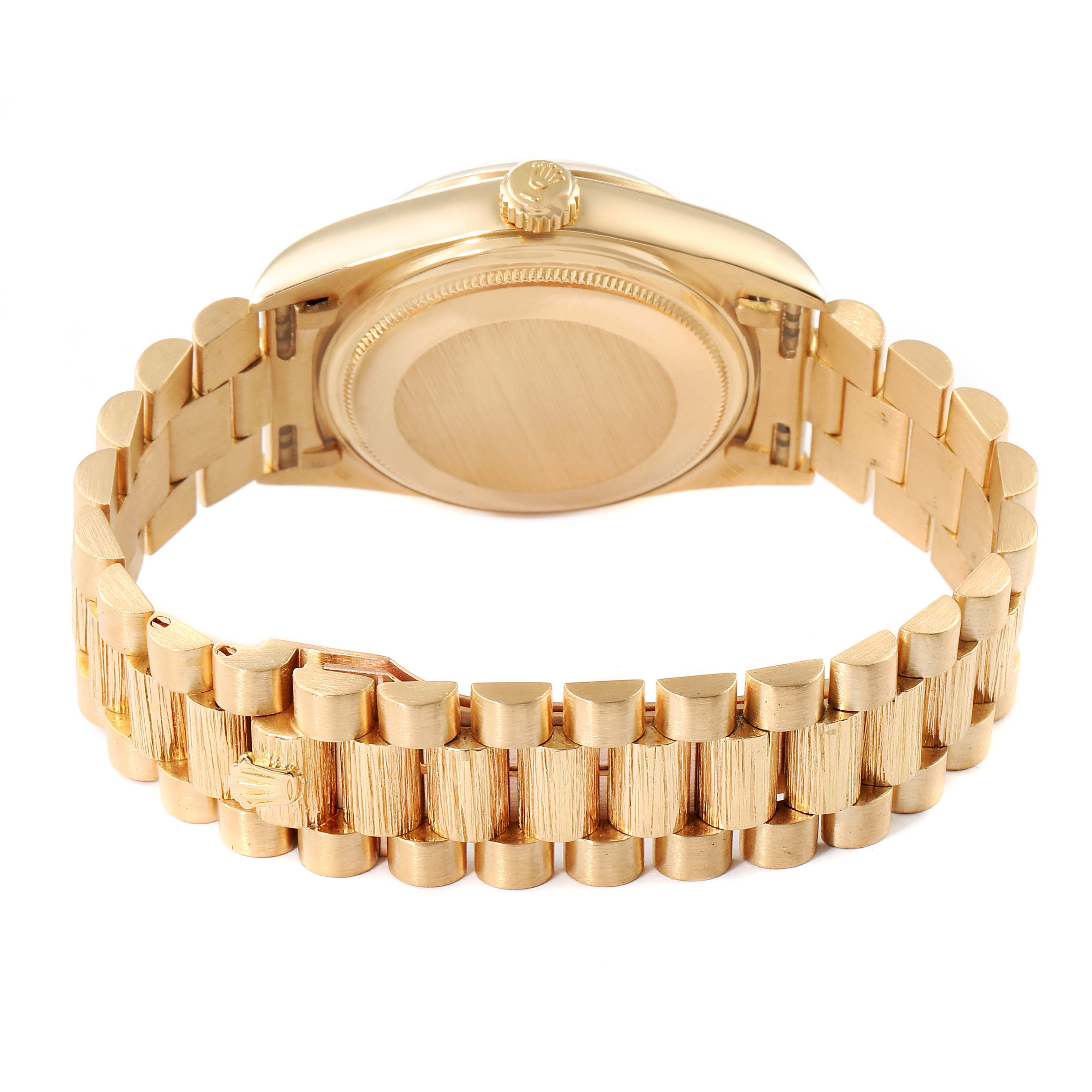 This image shows the back and bracelet of a Rolex President 18078 Men's Yellow Gold Blue Dial 18078 Men's Yellow Gold Blue Dial model watch at an angle.