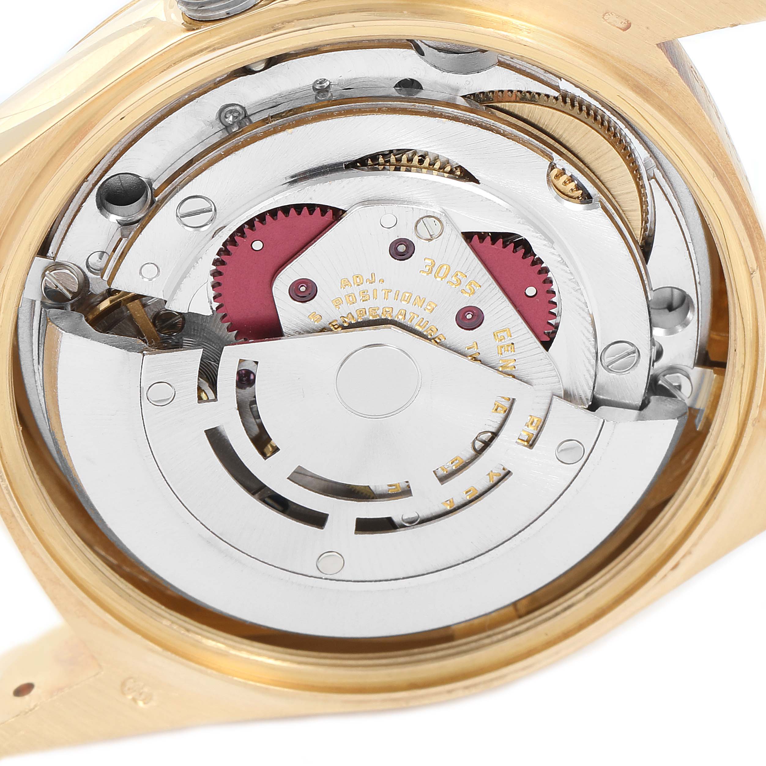 This image shows the movement mechanism of a Rolex President 18038 Men's Yellow Gold Black Dial 18038 Men's Yellow Gold Black Dial model, including gears and other internal components.