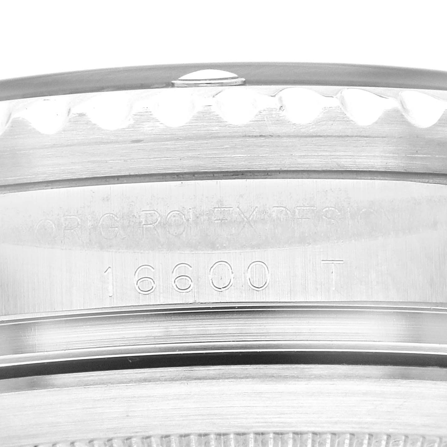 This close-up image shows the side of the Sea-Dweller model by Rolex, highlighting the serial number and bezel edge.