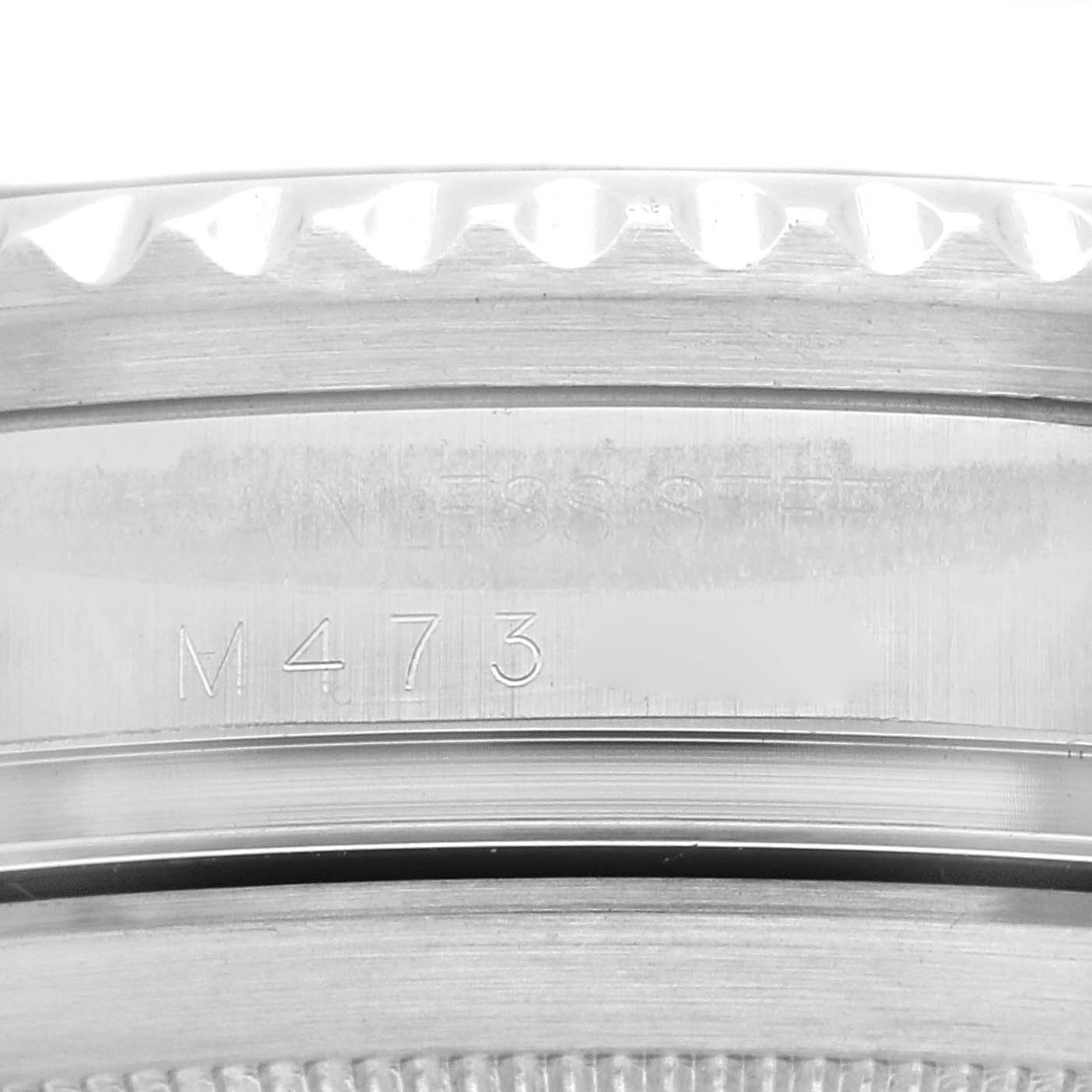 This close-up image shows the side engraving on the bezel and case of a Rolex Sea-Dweller 16600 Men
s Stainless Steel Black Dial 16600 Men
s Stainless Steel Black Dial watch, highlighting the serial number.