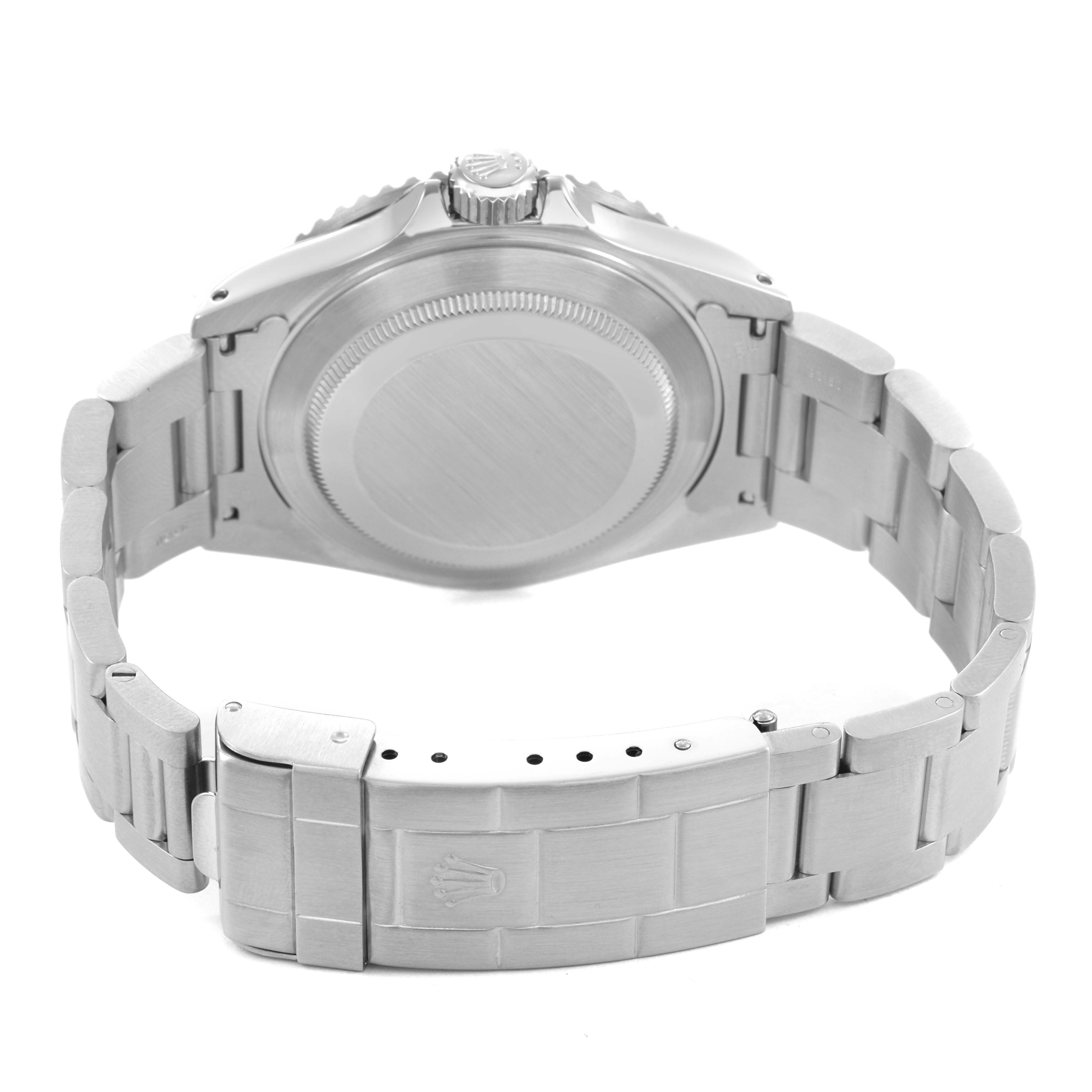 The image shows the back and clasp of a Rolex Submariner 16610 Men's Stainless Steel Black Dial watch, displaying the bracelet and caseback.
