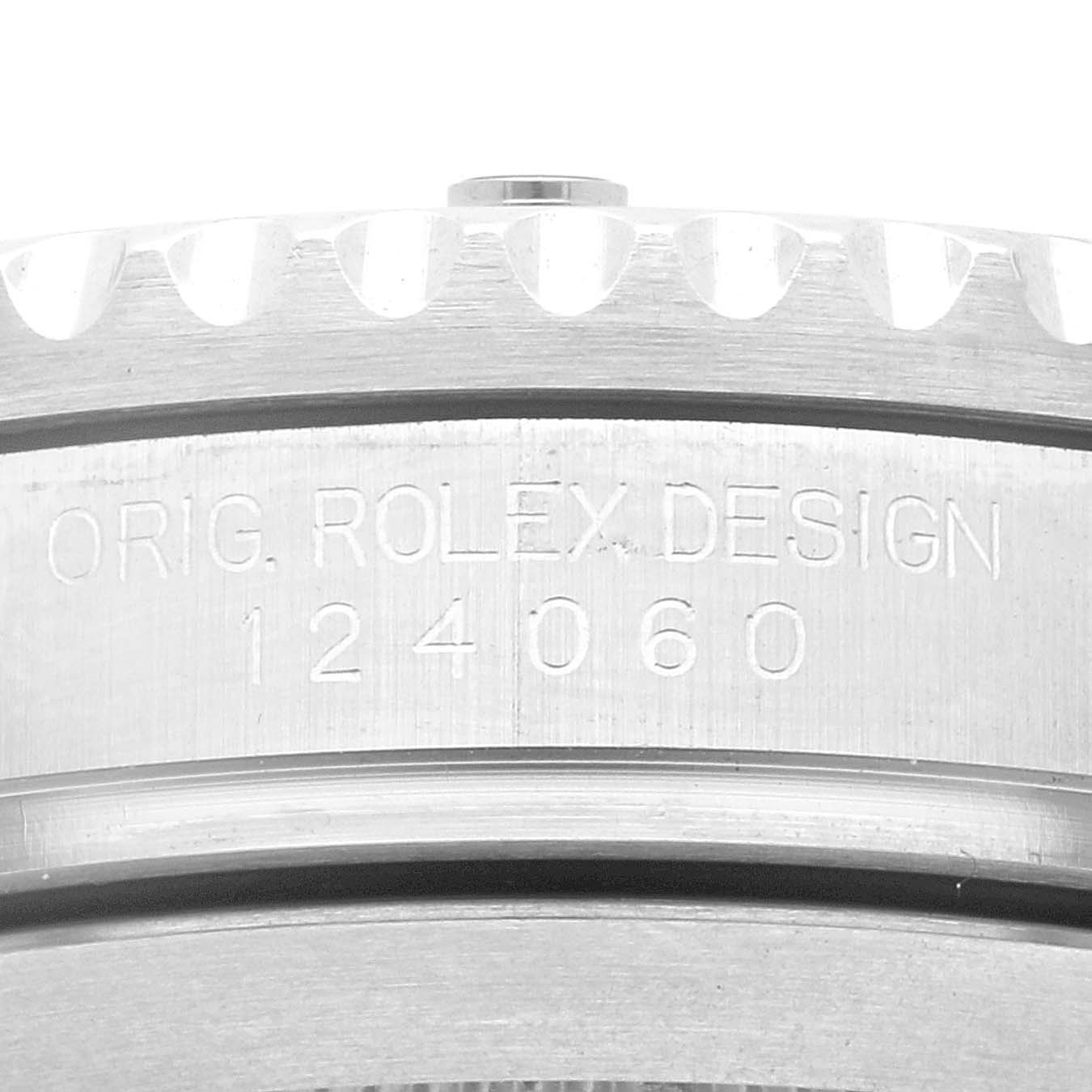The image shows a close-up of the side edge of the Rolex Submariner 124060 Men
s Stainless Steel Black Dial 124060 Men
s Stainless Steel Black Dial, highlighting the model number engraving.