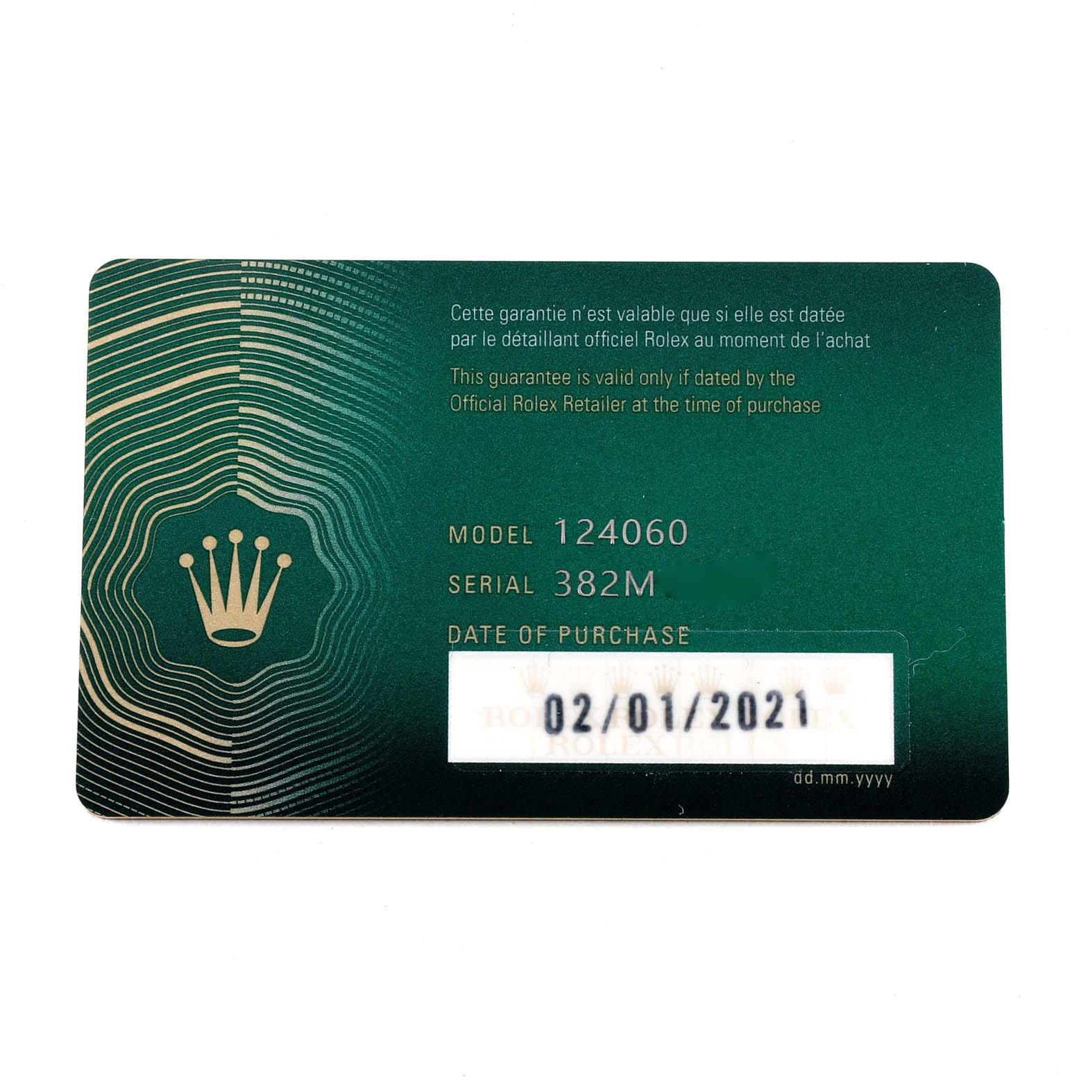 The image shows a green warranty card for a Rolex Submariner 124060 Men
s Stainless Steel Black Dial 124060 Men
s Stainless Steel Black Dial model 124060, featuring the brand logo and purchase date.