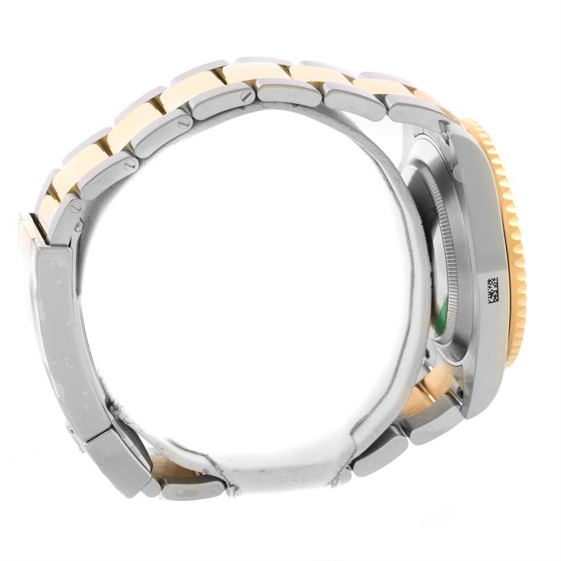 This image shows a side view of a Rolex Submariner 116613LN Men
s Steel and Gold (two tone) Black Dial 116613LN Men
s Steel and Gold (two tone) Black Dial watch, highlighting the bracelet and the side of the case.