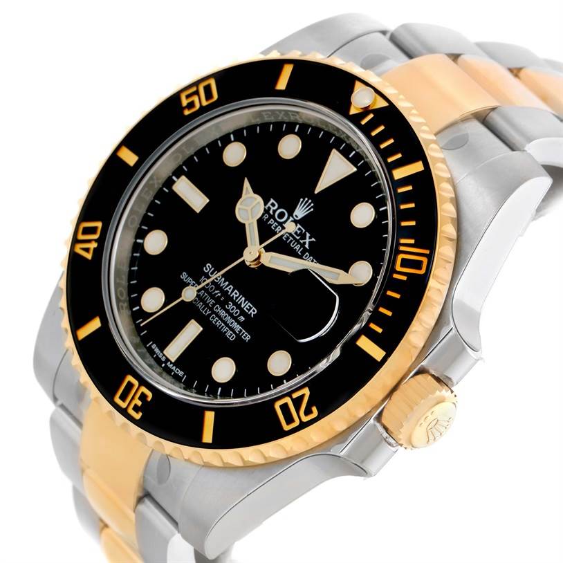 This image shows a close-up view of the Rolex Submariner 116613LN Men
s Steel and Gold (two tone) Black Dial 116613LN Men
s Steel and Gold (two tone) Black Dial watch, highlighting the bezel, dial, and part of the bracelet.