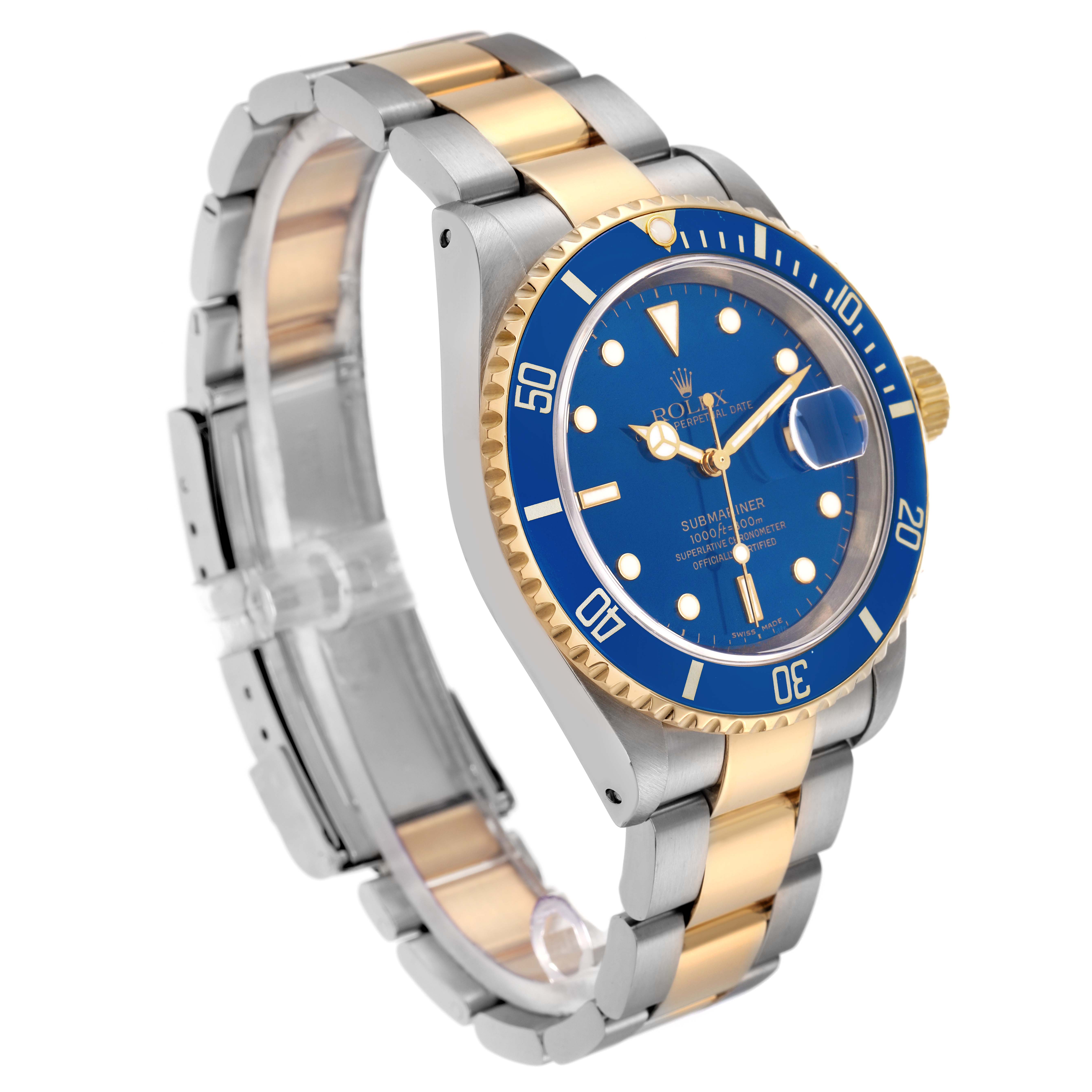 The Rolex Submariner 16613 Men
s Steel and Gold (two tone) Blue Dial 16613 Men
s Steel and Gold (two tone) Blue Dial watch is shown at a three-quarter angle, highlighting the bracelet, bezel, and dial.