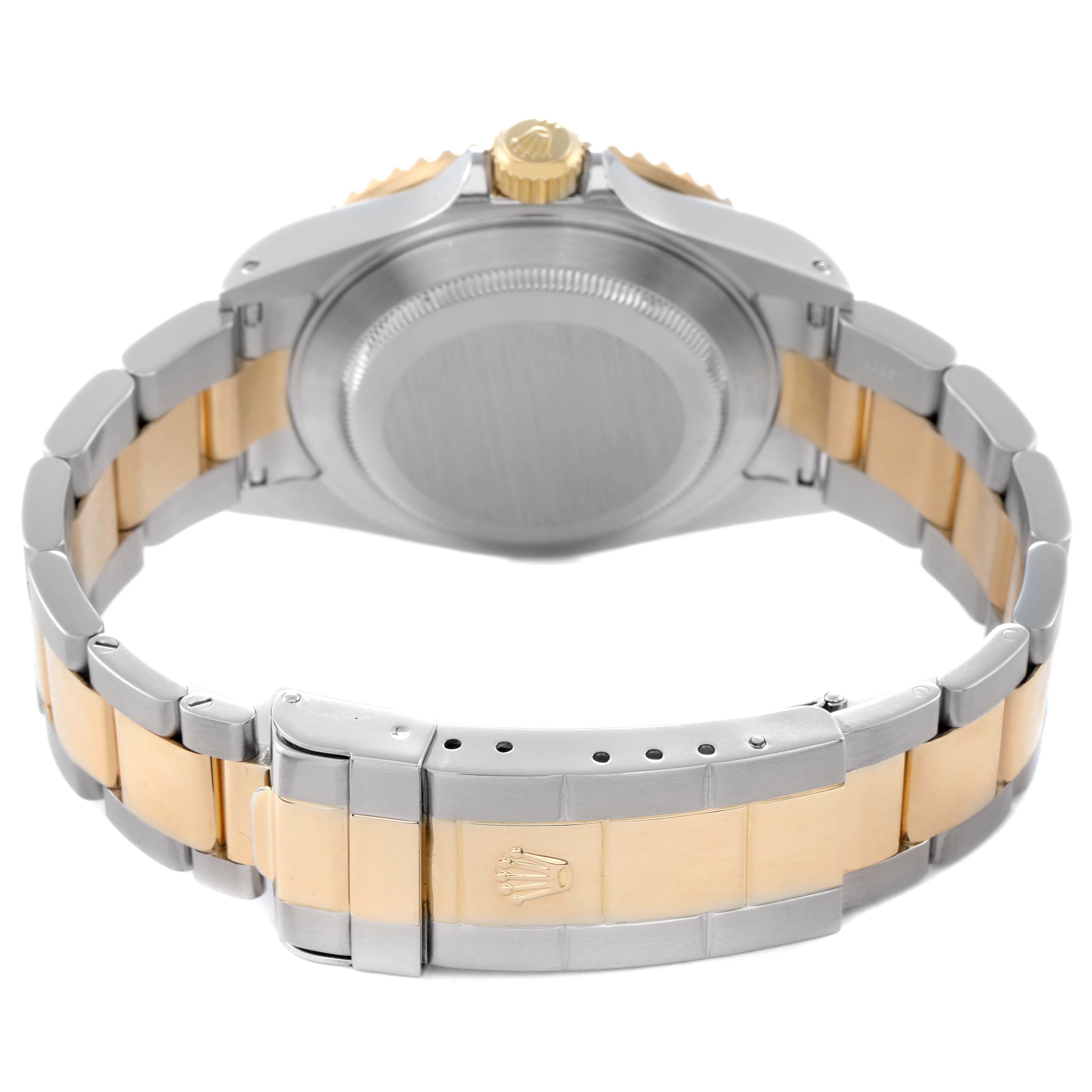 The Rolex Submariner 16613 Men
s Steel and Gold (two tone) Blue Dial 16613 Men
s Steel and Gold (two tone) Blue Dial is shown from the back, displaying the bracelet, clasp, and case back.