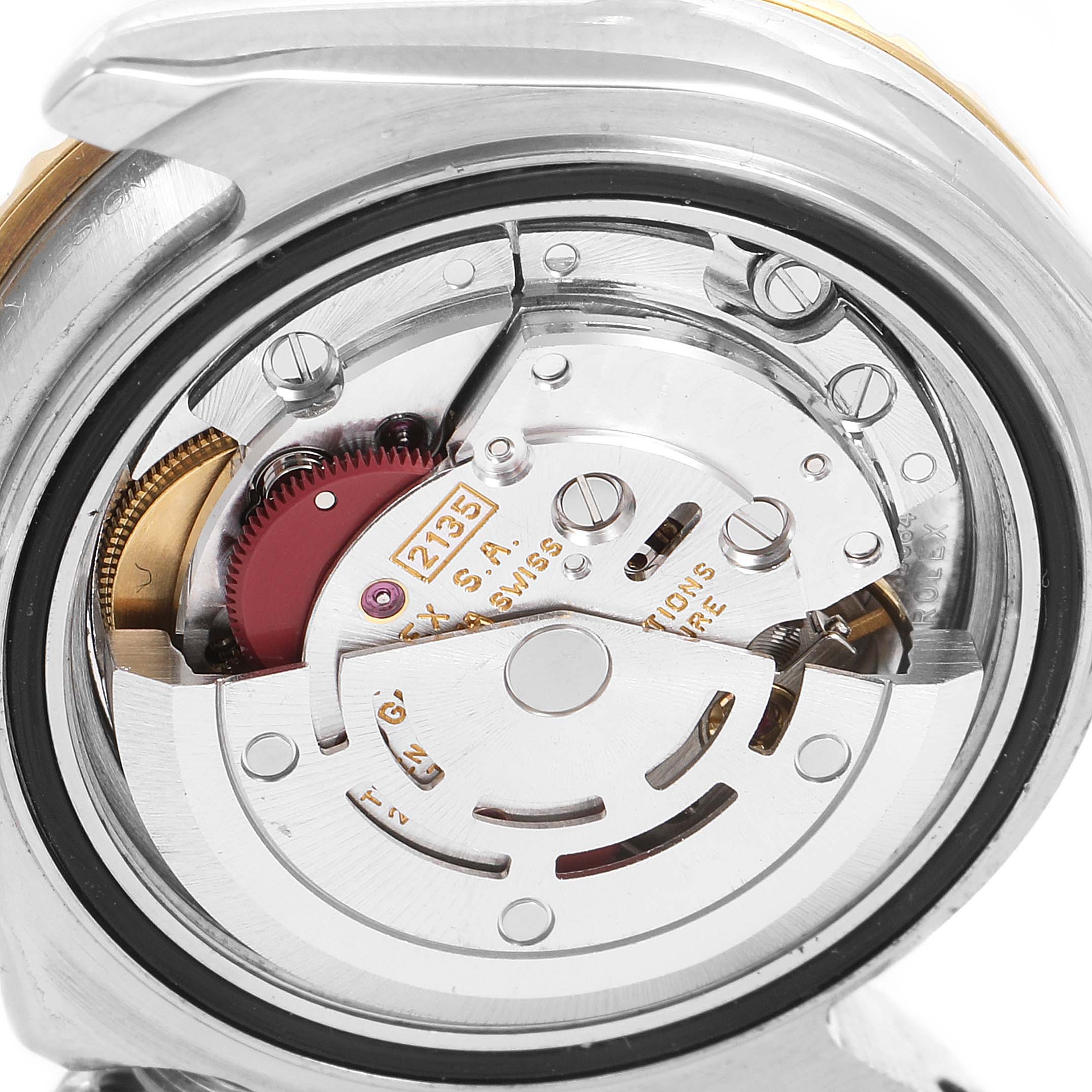 The image shows the internal mechanism of a Rolex Yacht-Master 69623 Women's Steel and Gold (two tone) White Dial 69623 Women's Steel and Gold (two tone) White Dial watch, focusing on the movement and mechanical components.
