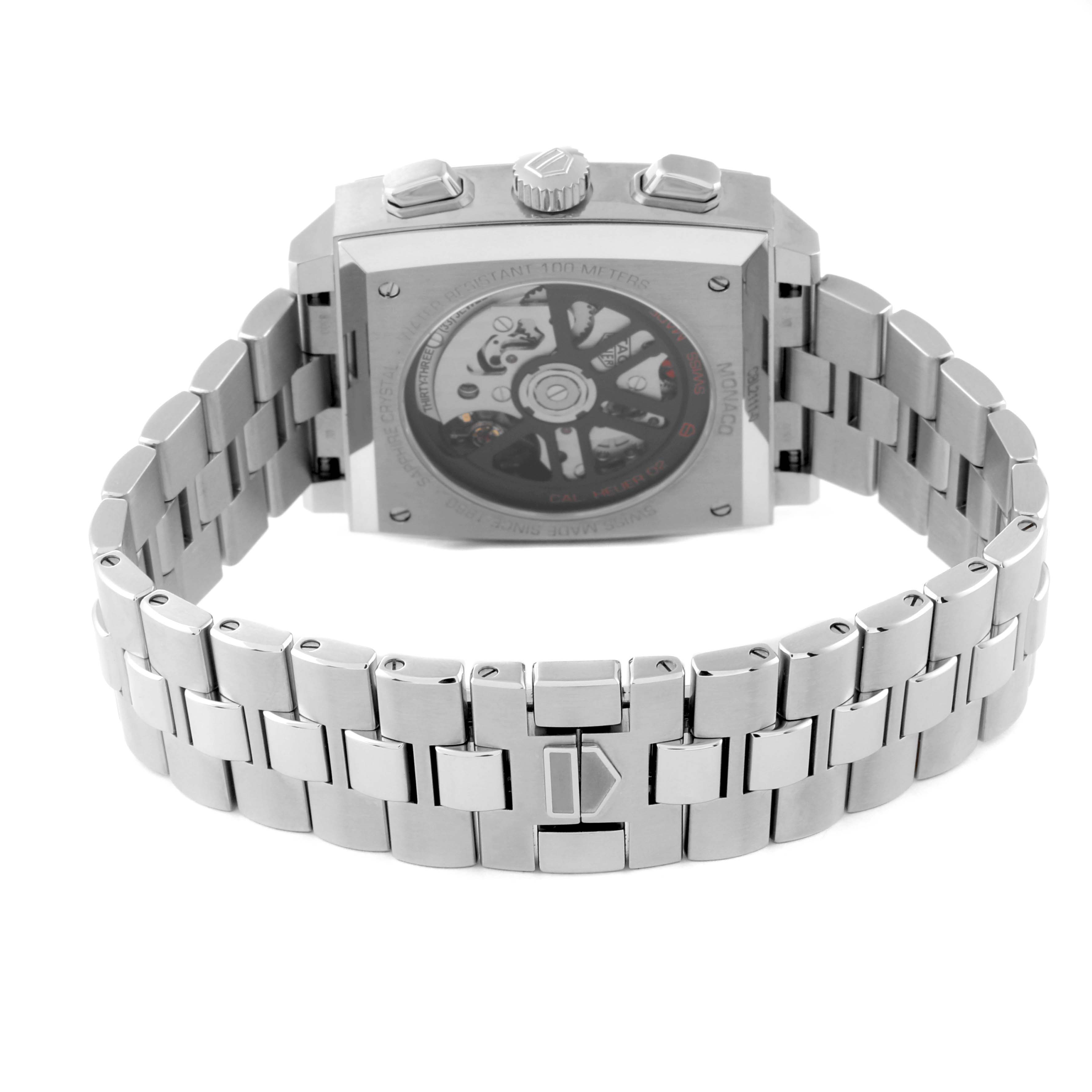 The image shows the back of a Tag Heuer Monaco CBL2111.BA0644 Men
s Stainless Steel Blue Dial CBL2111.BA0644 Men
s Stainless Steel Blue Dial watch, highlighting the automatic movement and stainless steel bracelet.