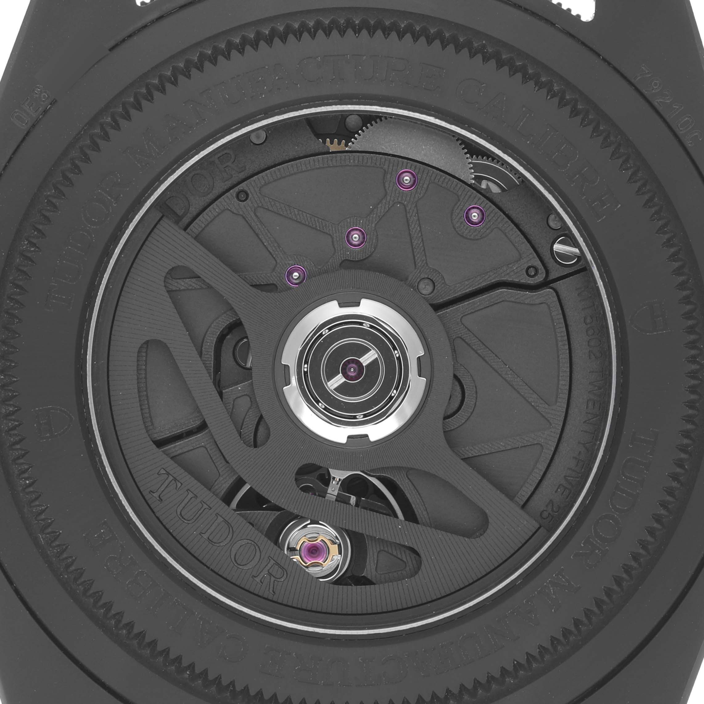 This is a close-up image of the movement mechanism of the Tudor Heritage Black Bay 79210CNU Men
s Ceramic Black Dial 79210CNU Men
s Ceramic Black Dial watch.