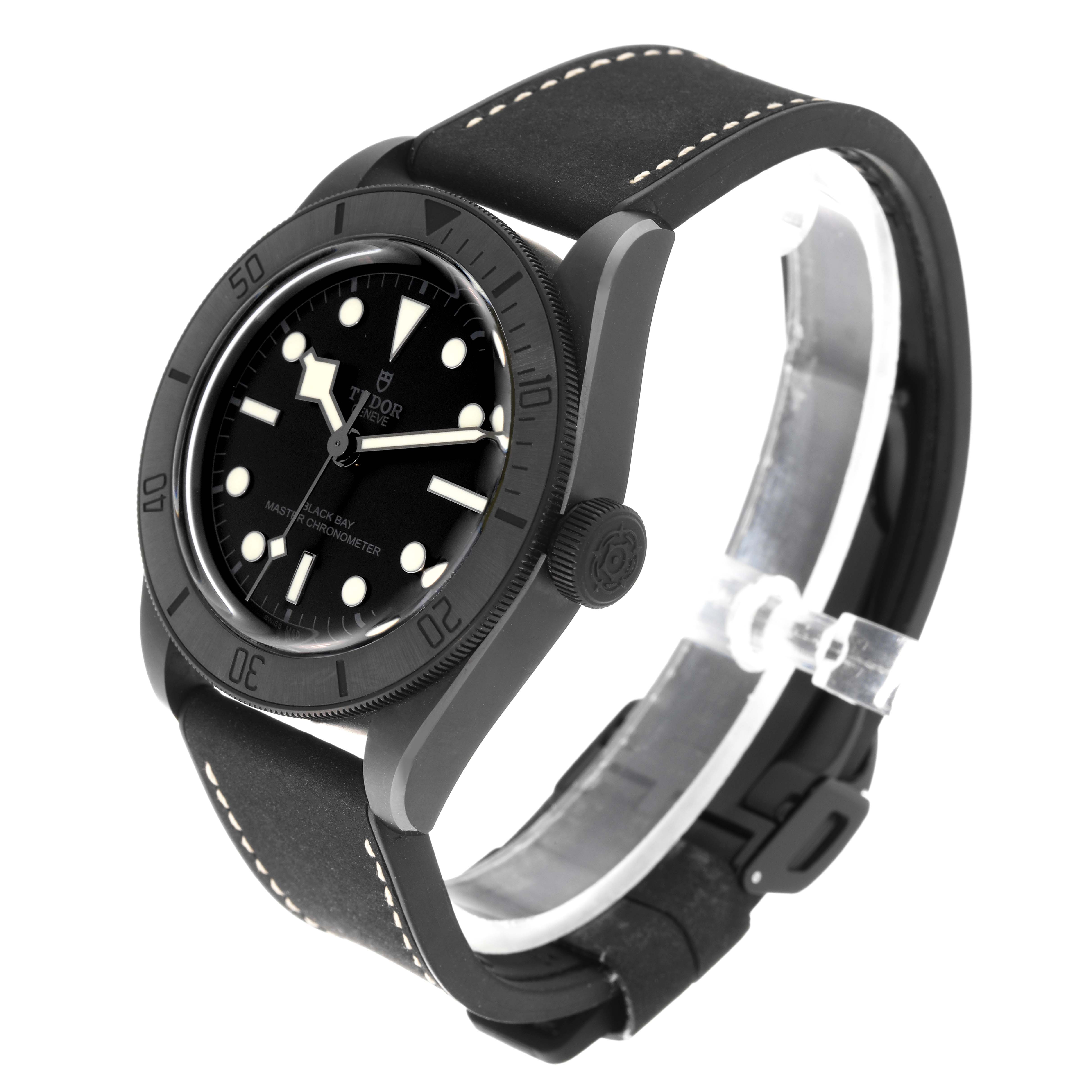 The Tudor Heritage Black Bay 79210CNU Men
s Ceramic Black Dial 79210CNU Men
s Ceramic Black Dial watch is shown at a front angle, displaying its black dial, bezel, case, and strap.