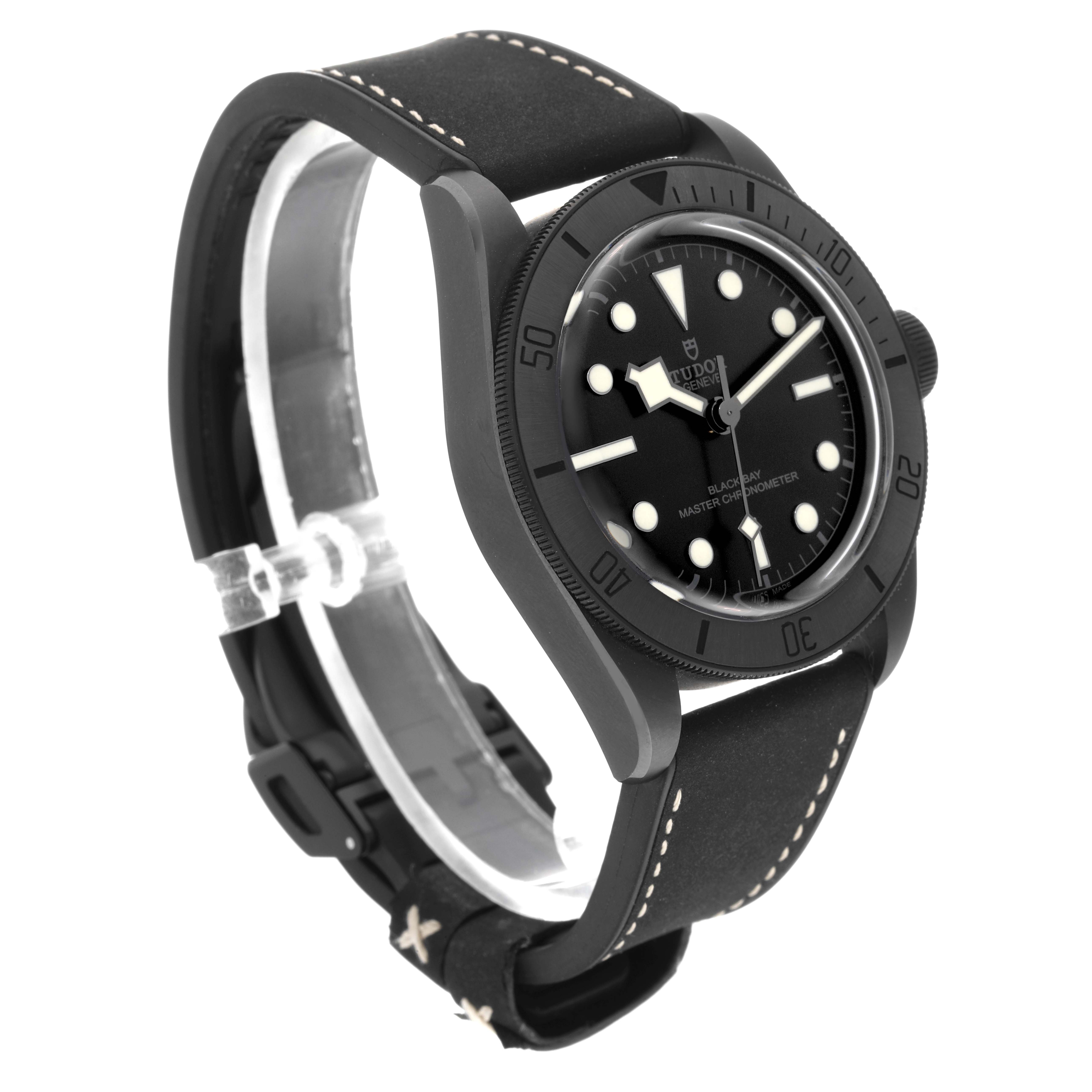 The Tudor Heritage Black Bay 79210CNU Men
s Ceramic Black Dial 79210CNU Men
s Ceramic Black Dial watch is shown at a front-left angle, displaying the dial, bezel, and leather strap.