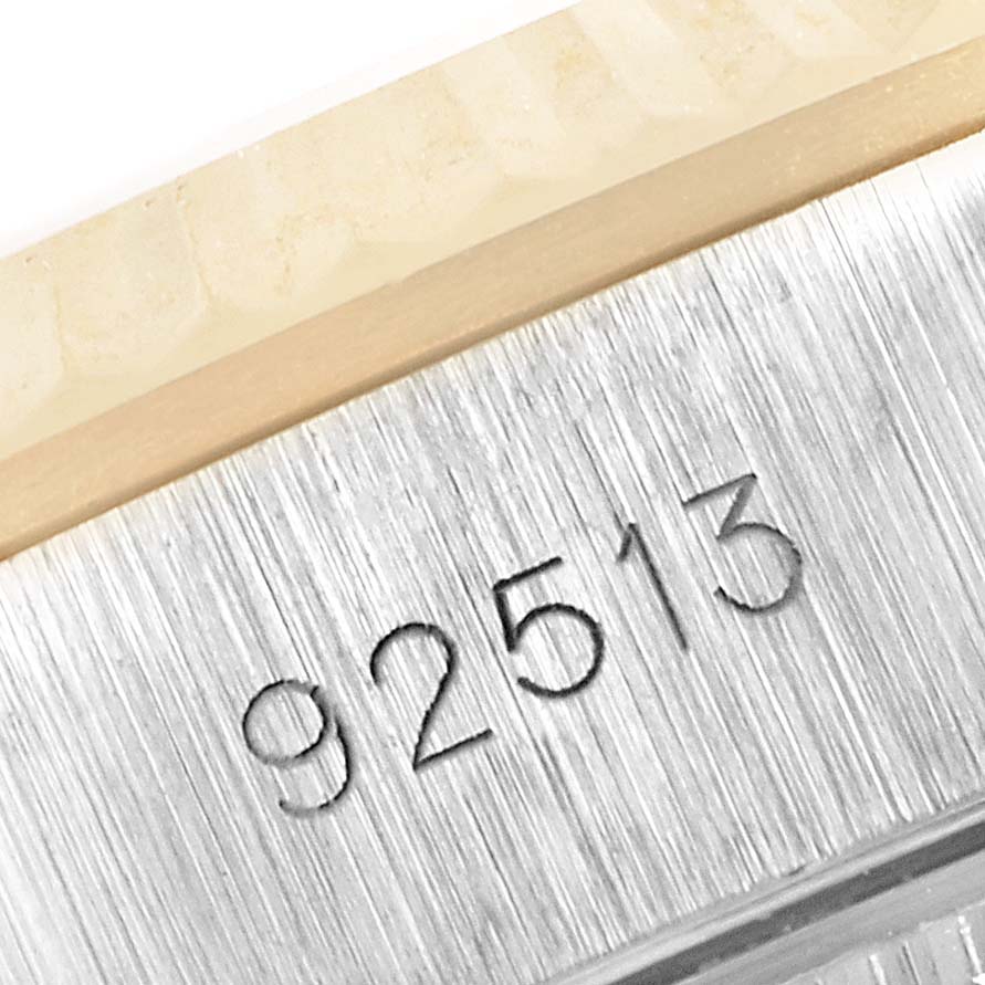 This close-up image shows the model number engraving on the metal case of the Tudor Princess 92513 Women's Steel and Gold (two tone) Silver Dial 92513 Women's Steel and Gold (two tone) Silver Dial watch.
