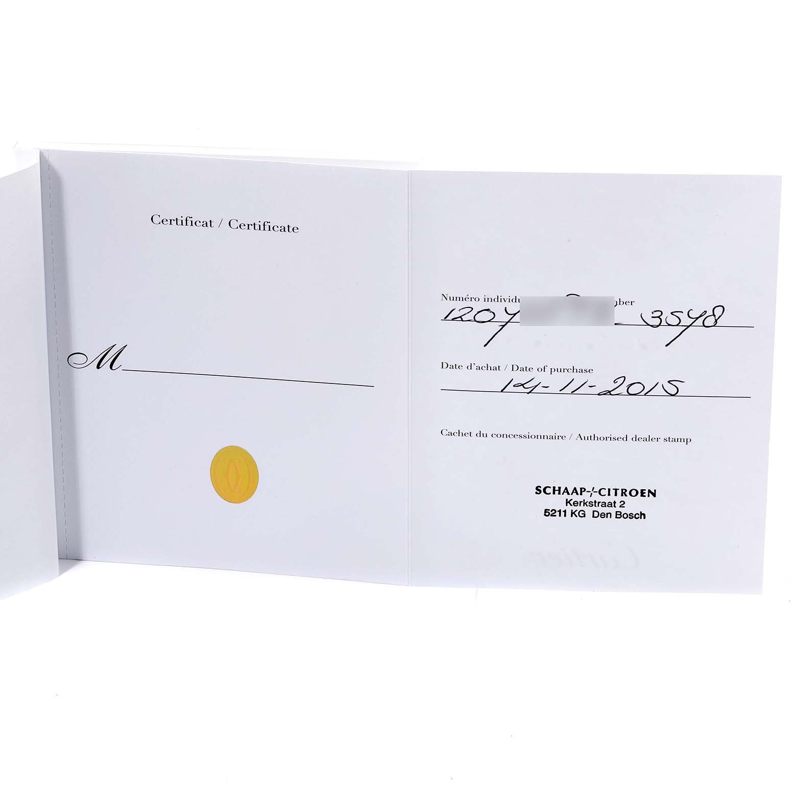 This image shows the warranty certificate for a Calibre de Cartier watch by Cartier.