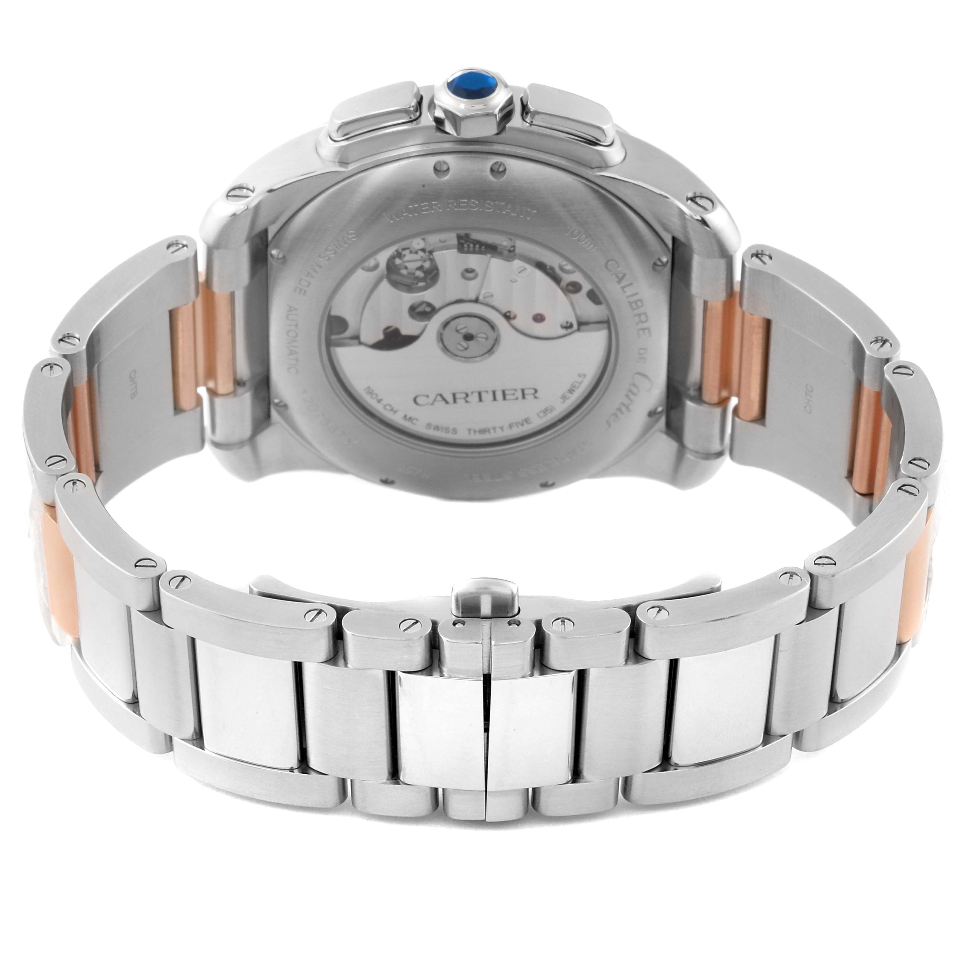 The image shows the back and bracelet of a Calibre de Cartier watch by Cartier, highlighting its clasp and movement.