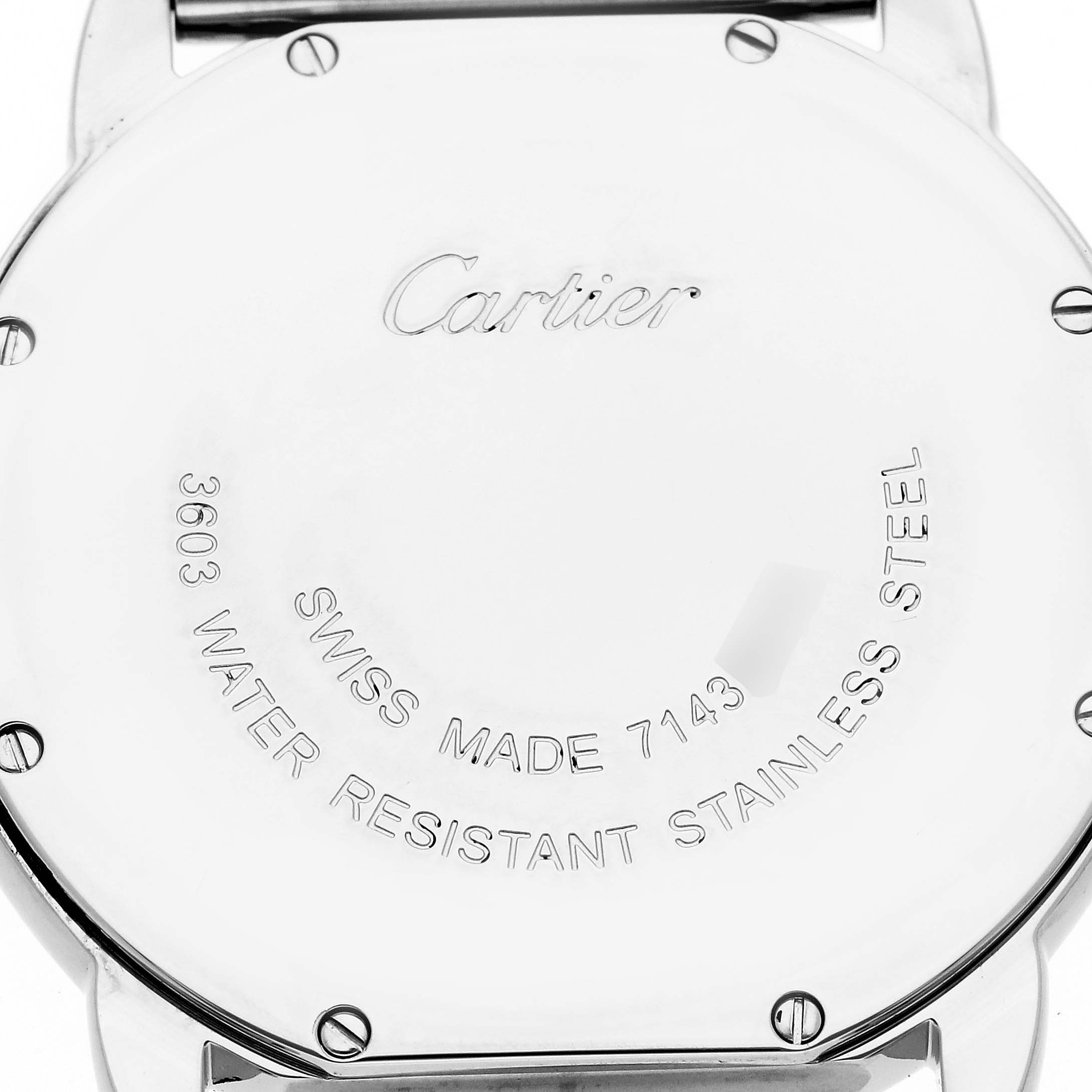 The image shows the back case of a Cartier Ronde W6701005 Men
s Stainless Steel Silver Dial W6701005 Men
s Stainless Steel Silver Dial watch with the brand name and specifications engraved.