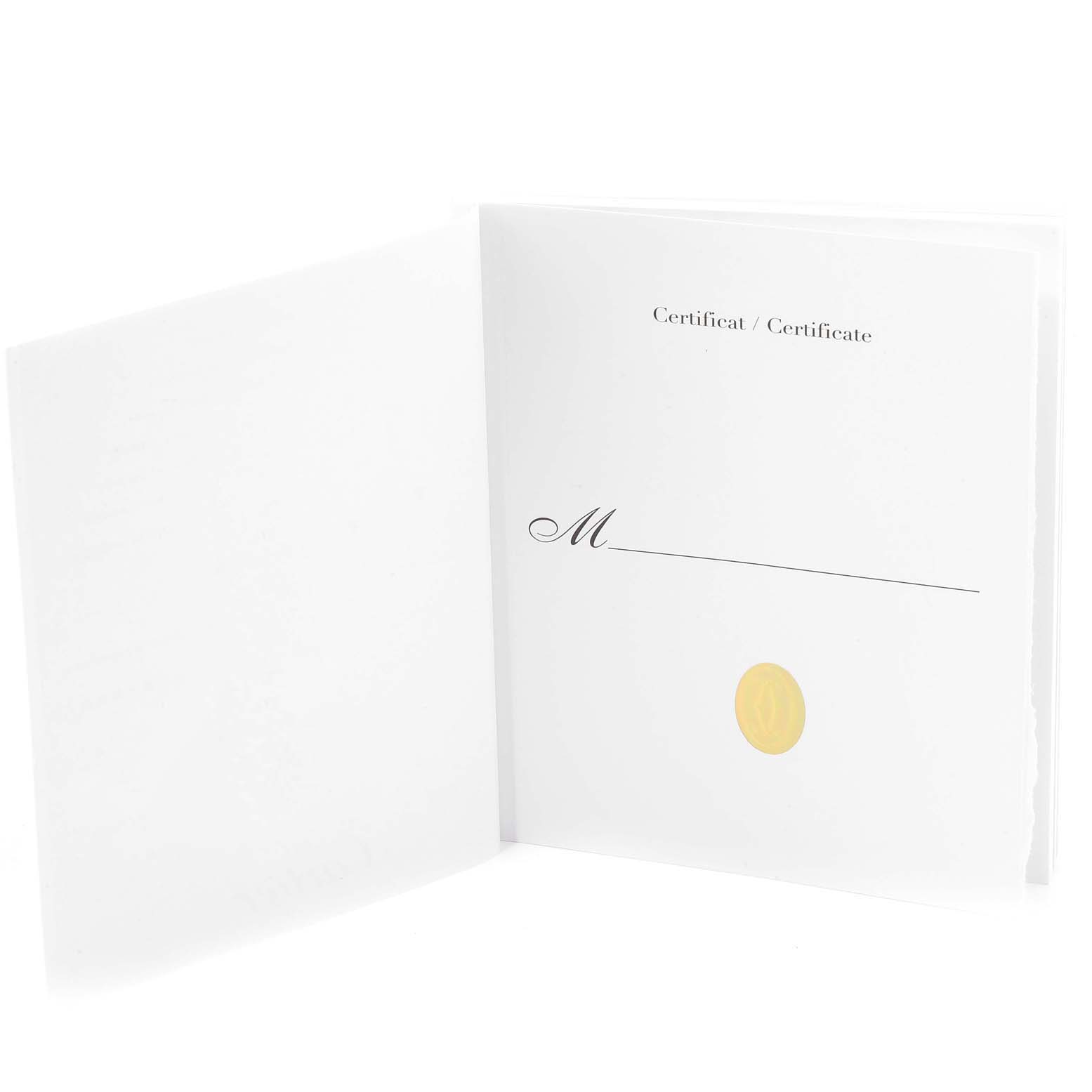 This image shows the certificate for the Santos model by Cartier, featuring an open booklet with a blank entry field.