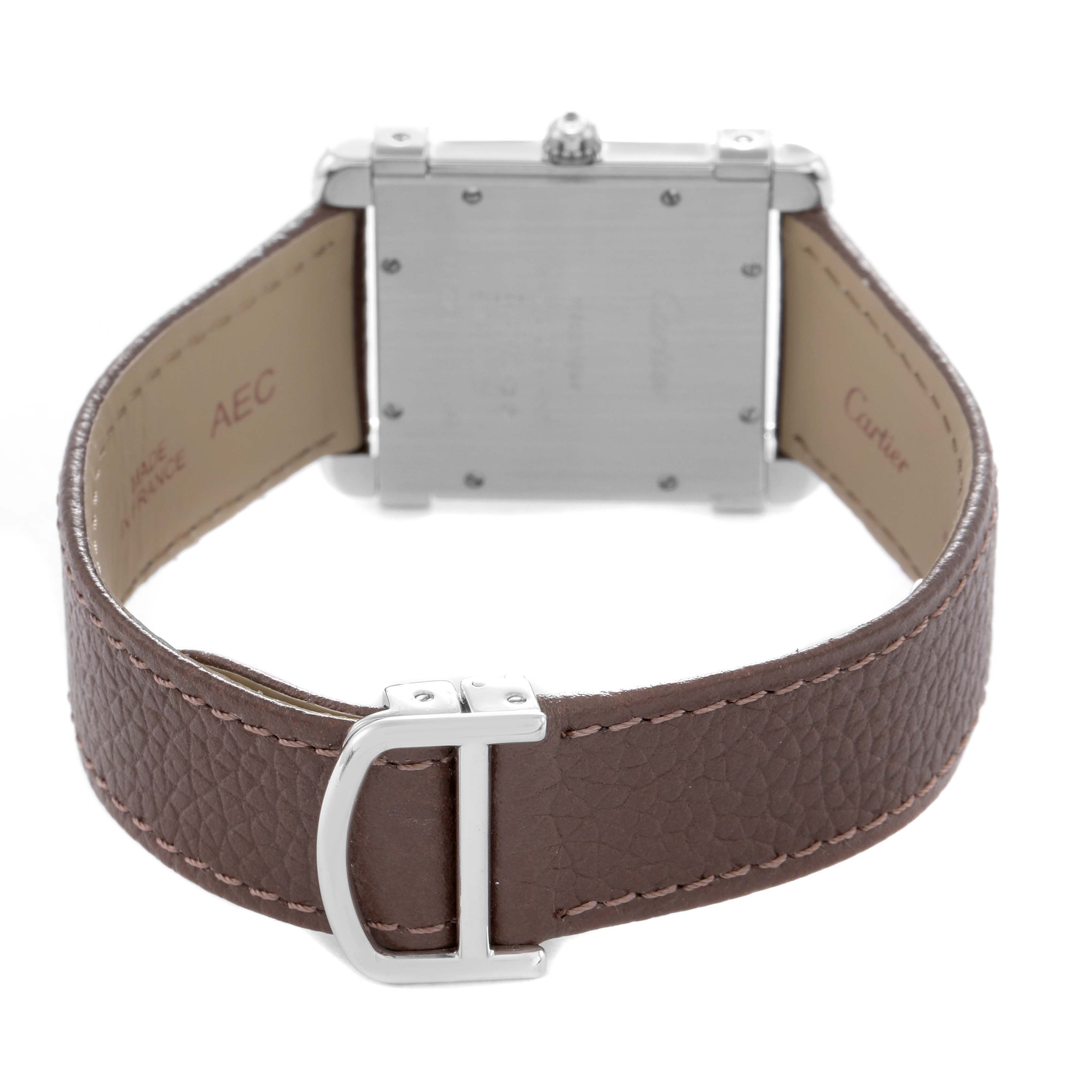 The image shows the back view of a Cartier Tank Louis WE300251 Men's Platinum Silver Dial WE300251 Men's Platinum Silver Dial watch, highlighting the case back and leather strap with a buckle.