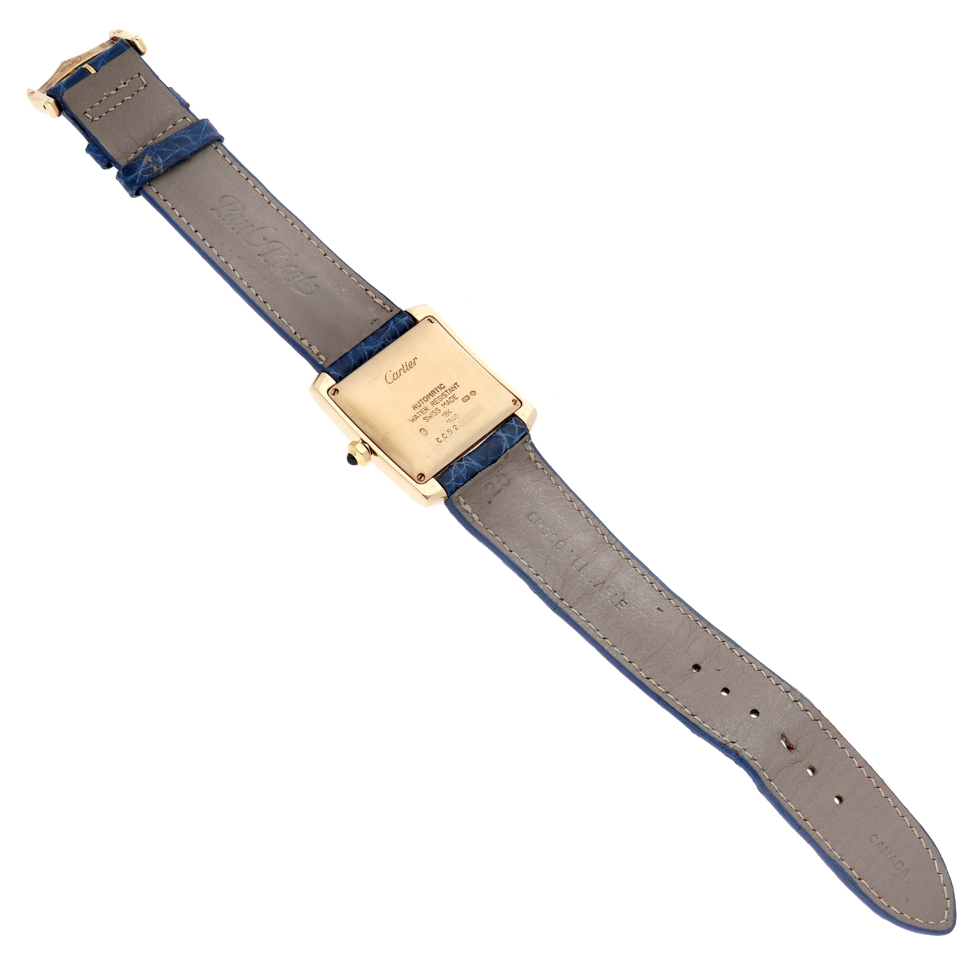 The image shows the back view of the Cartier Tank Francaise W5000156 Men
s Yellow Gold Silver Dial W5000156 Men
s Yellow Gold Silver Dial watch, highlighting the watch case and strap.