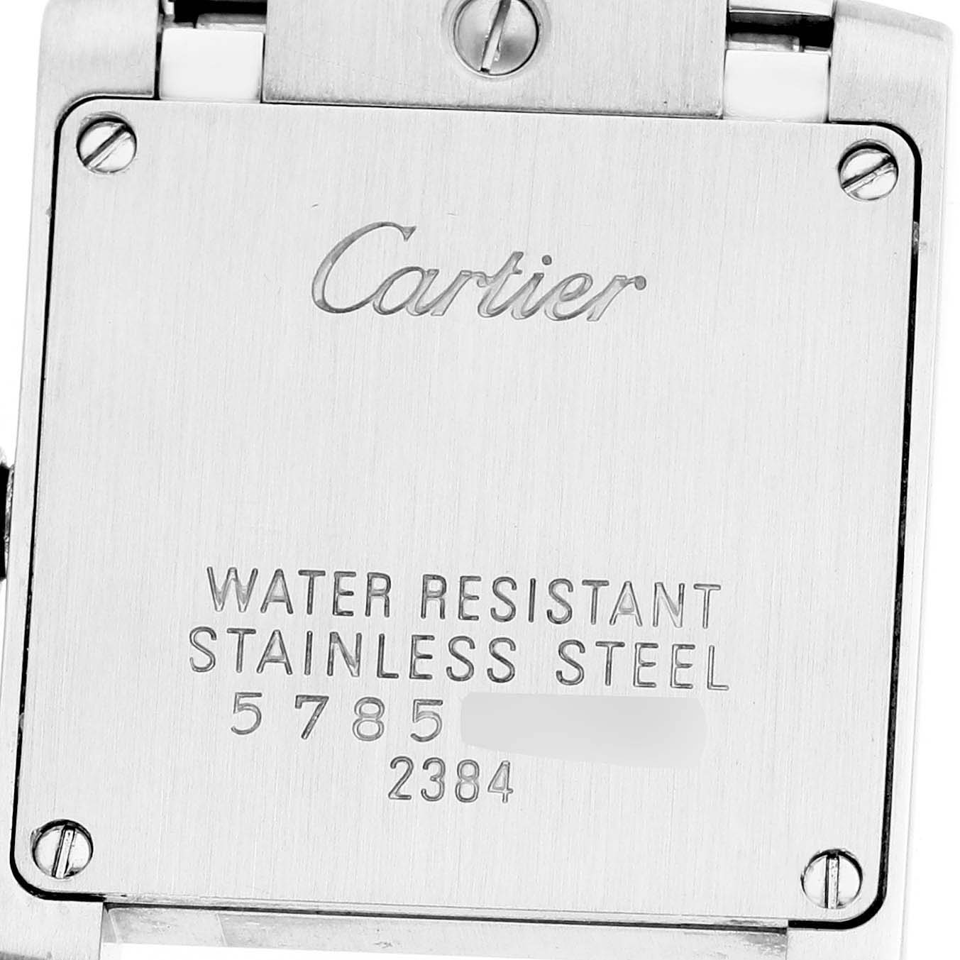 The image shows the back of a Cartier Tank Française watch, highlighting its stainless steel and water-resistant markings.
