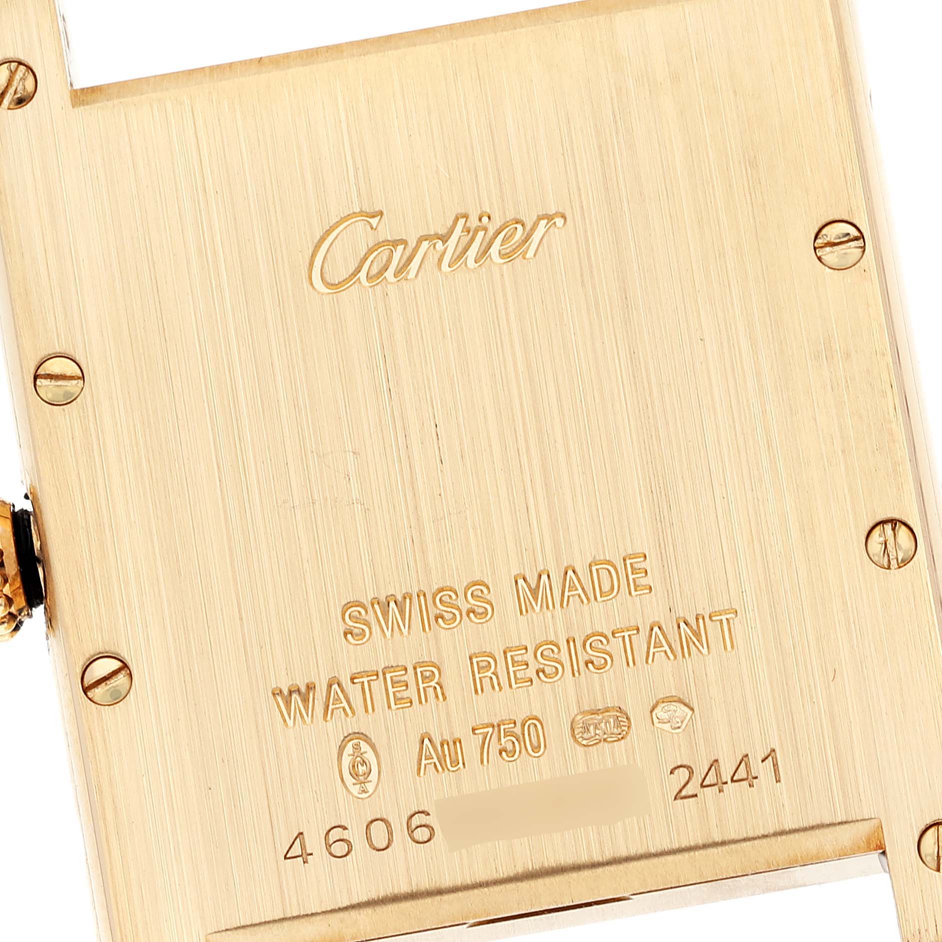 The image shows the back case of a Cartier Tank Louis W1529756 Men's Yellow Gold White Dial W1529756 Men's Yellow Gold White Dial model watch, highlighting the engravings and screws.