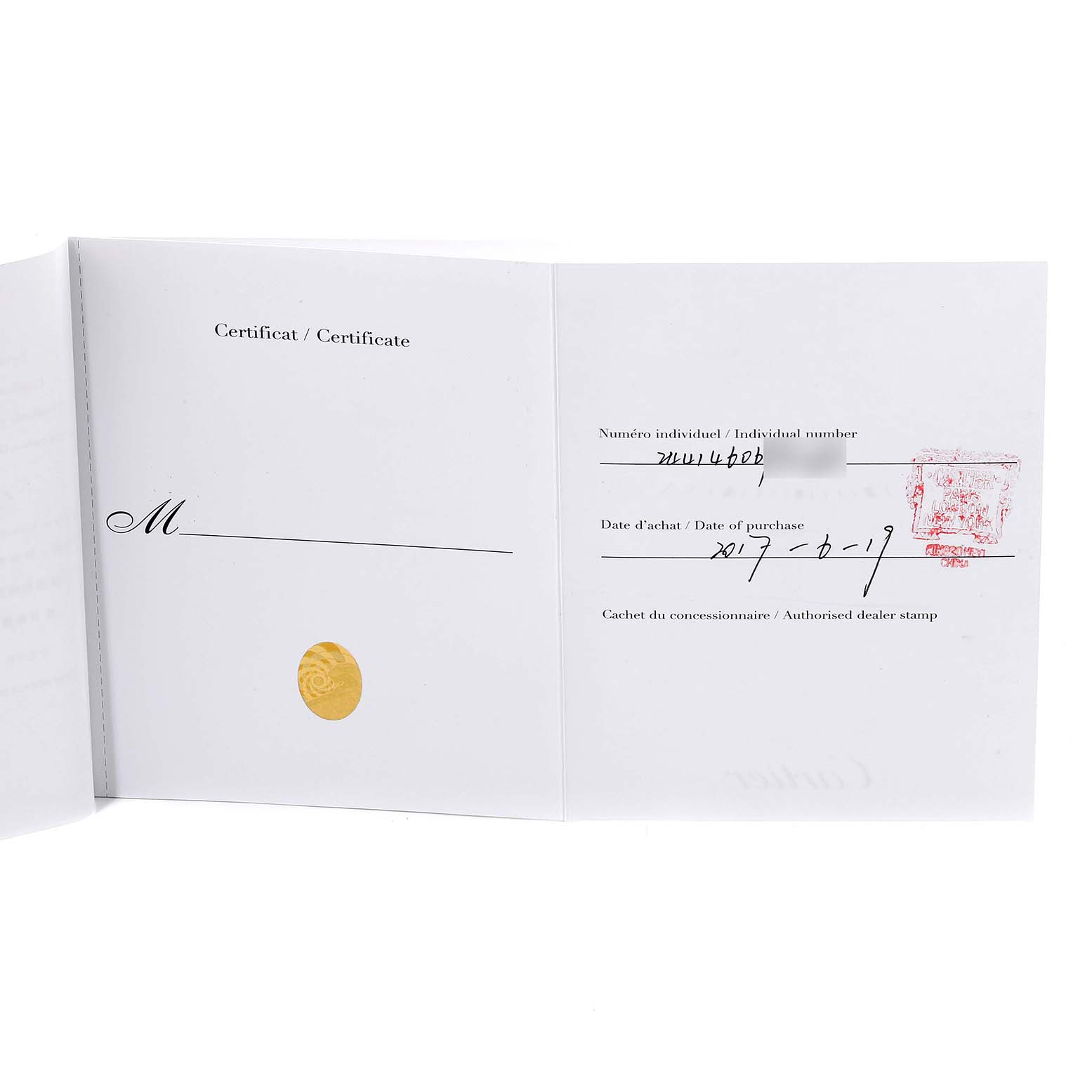 This image shows the certificate and warranty booklet for the Tank Louis model by Cartier.