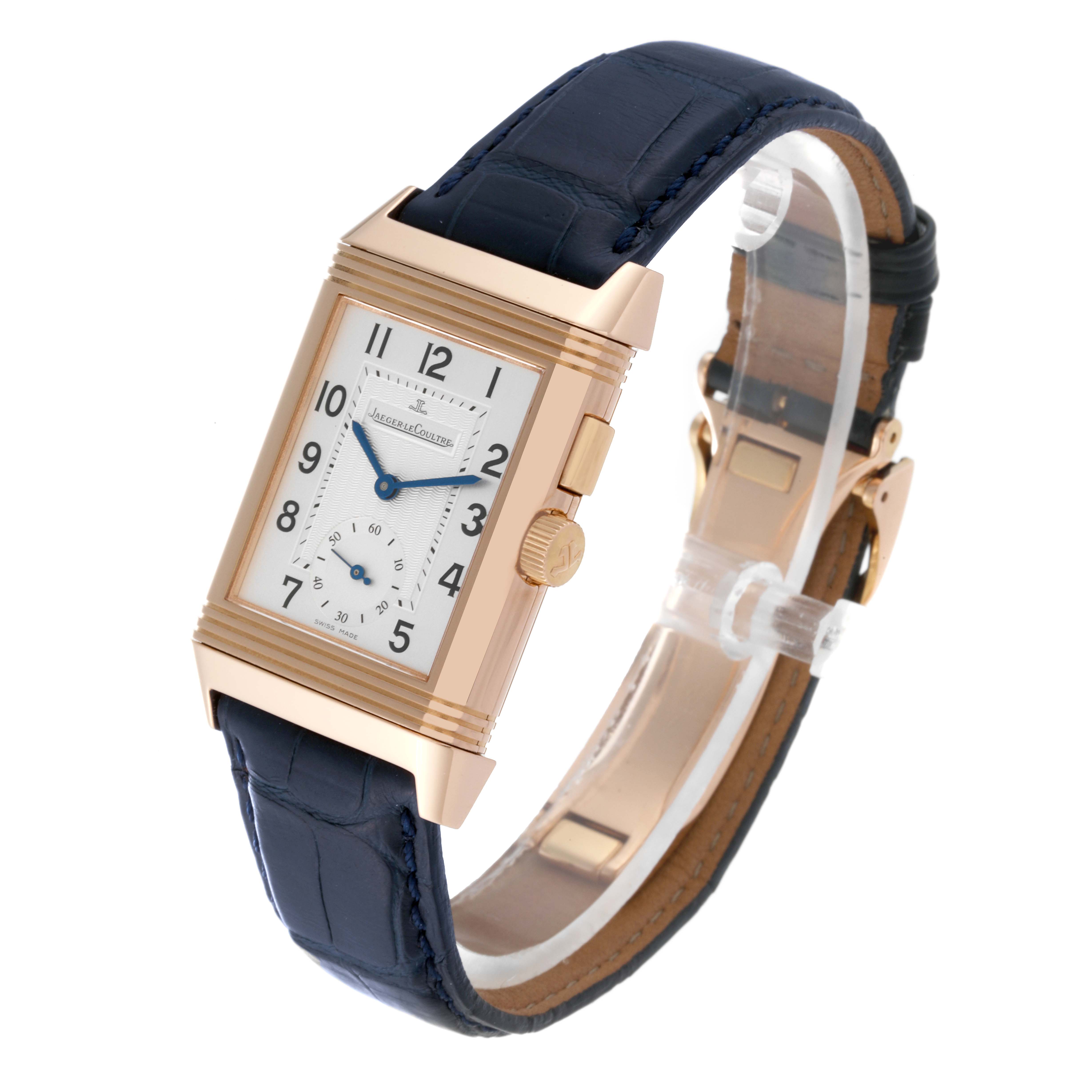 The image shows a Jaeger LeCoultre Reverso Q2712411 Men's Rose Gold Silver Dial Q2712411 Men's Rose Gold Silver Dial watch at a slight angle, highlighting its face, case, crown, and leather strap.