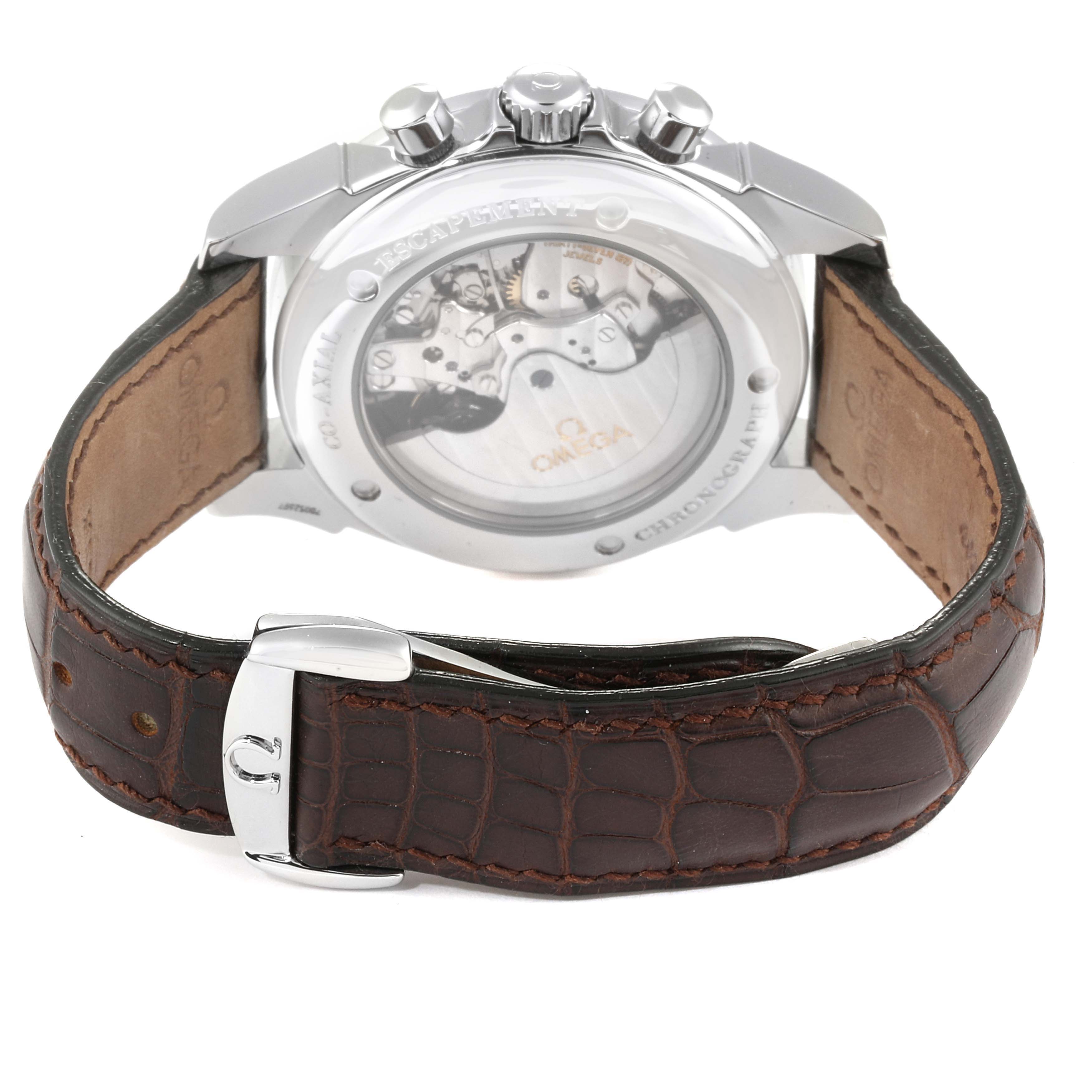 The image shows the back view of the Omega De Ville 4841.31.32 Men's Stainless Steel Silver Dial 4841.31.32 Men's Stainless Steel Silver Dial watch, highlighting its movement and brown leather strap.