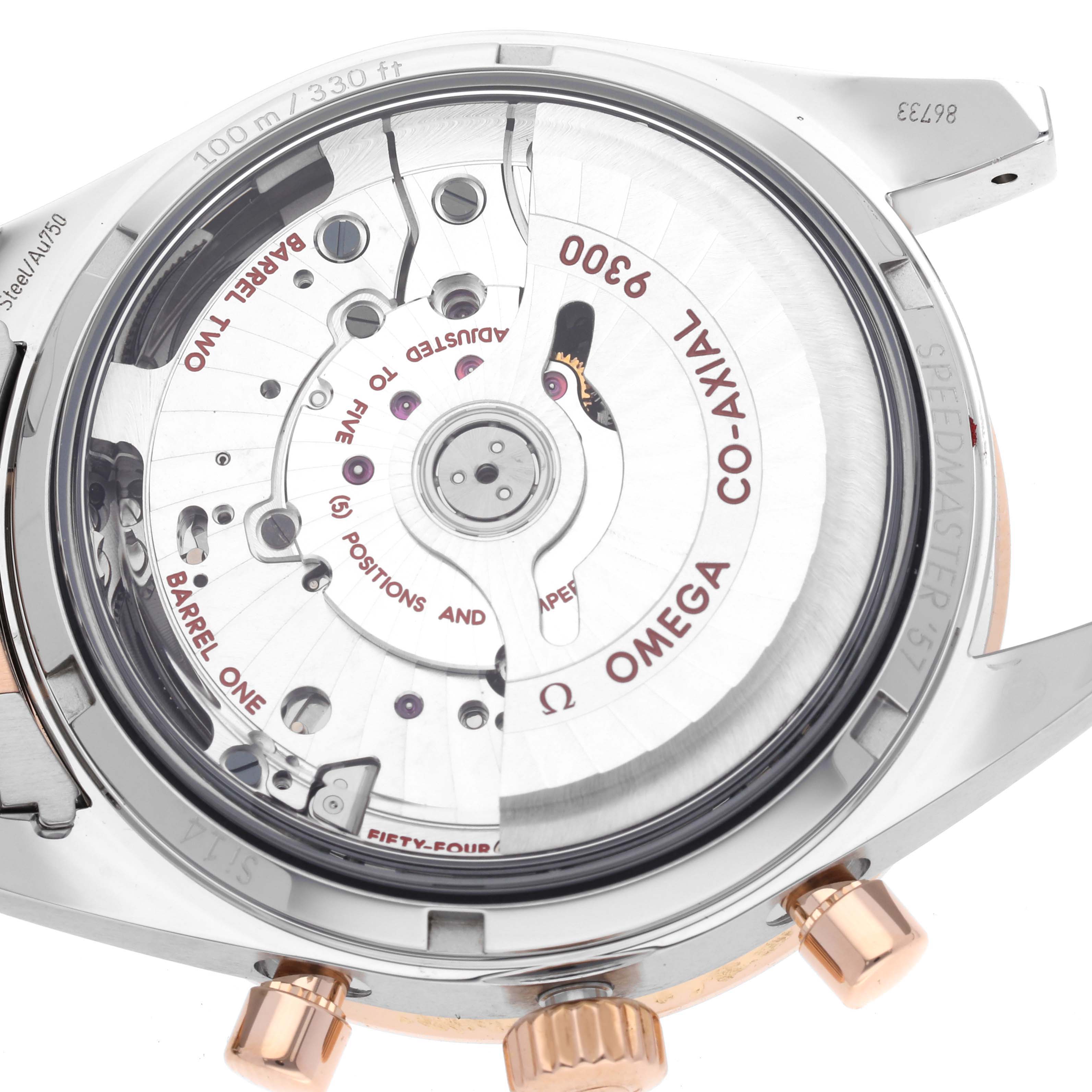 The image shows the back view of the Omega Speedmaster 331.20.42.51.01.002 Men's Steel and Gold (two tone) Black Dial 331.20.42.51.01.002 Men's Steel and Gold (two tone) Black Dial watch, revealing the intricate details of its Co-Axial movement.