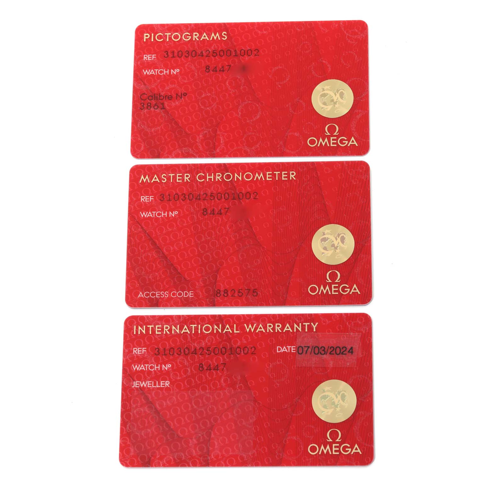 The image shows three certification cards for the Omega Speedmaster 310.30.42.50.01.002 Men
s Stainless Steel Black Dial 310.30.42.50.01.002 Men
s Stainless Steel Black Dial model: Pictograms, Master Chronometer, and International Warranty.