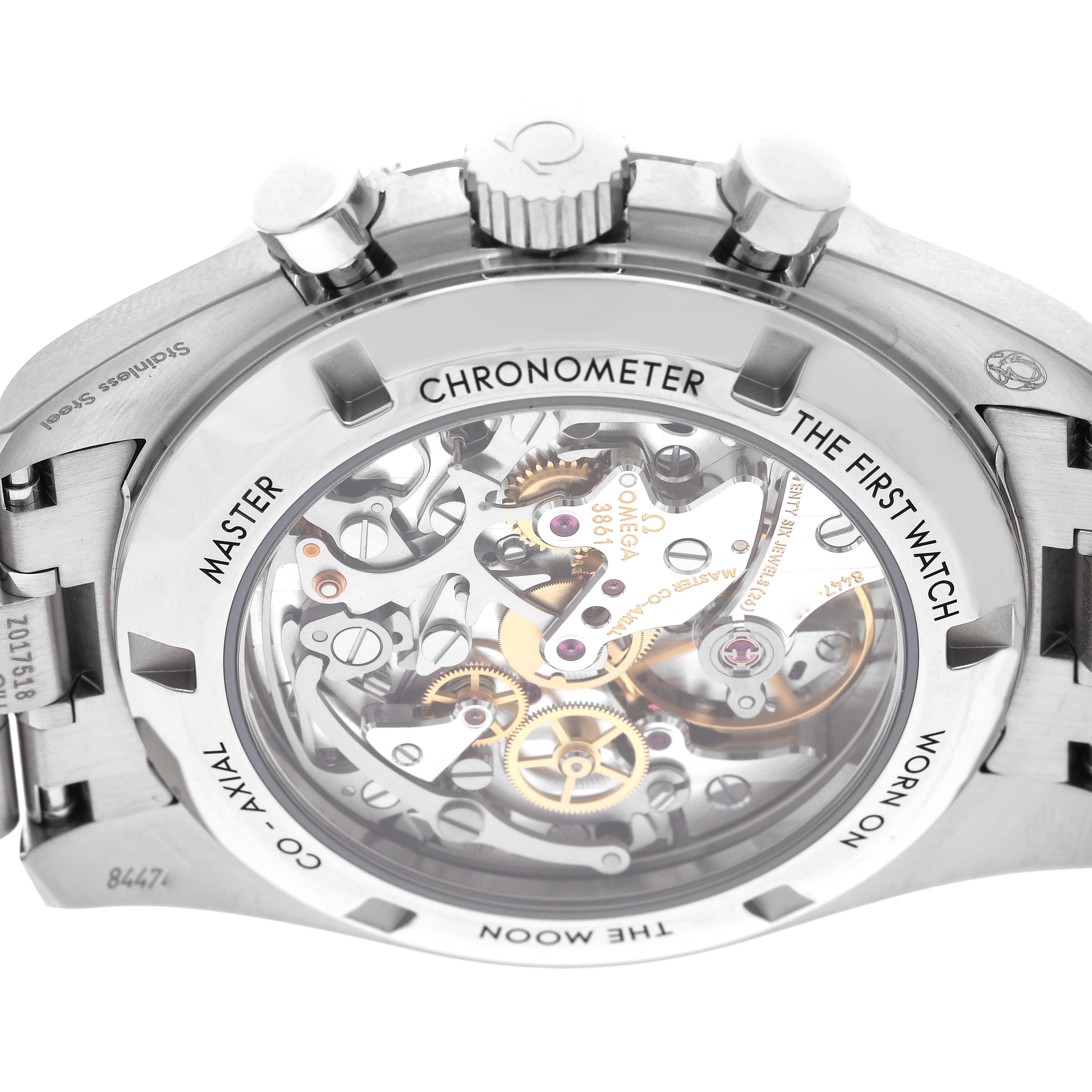 The image shows the back of the Omega Speedmaster 310.30.42.50.01.002 Men
s Stainless Steel Black Dial 310.30.42.50.01.002 Men
s Stainless Steel Black Dial watch, revealing its intricate mechanical movement through a clear case back.