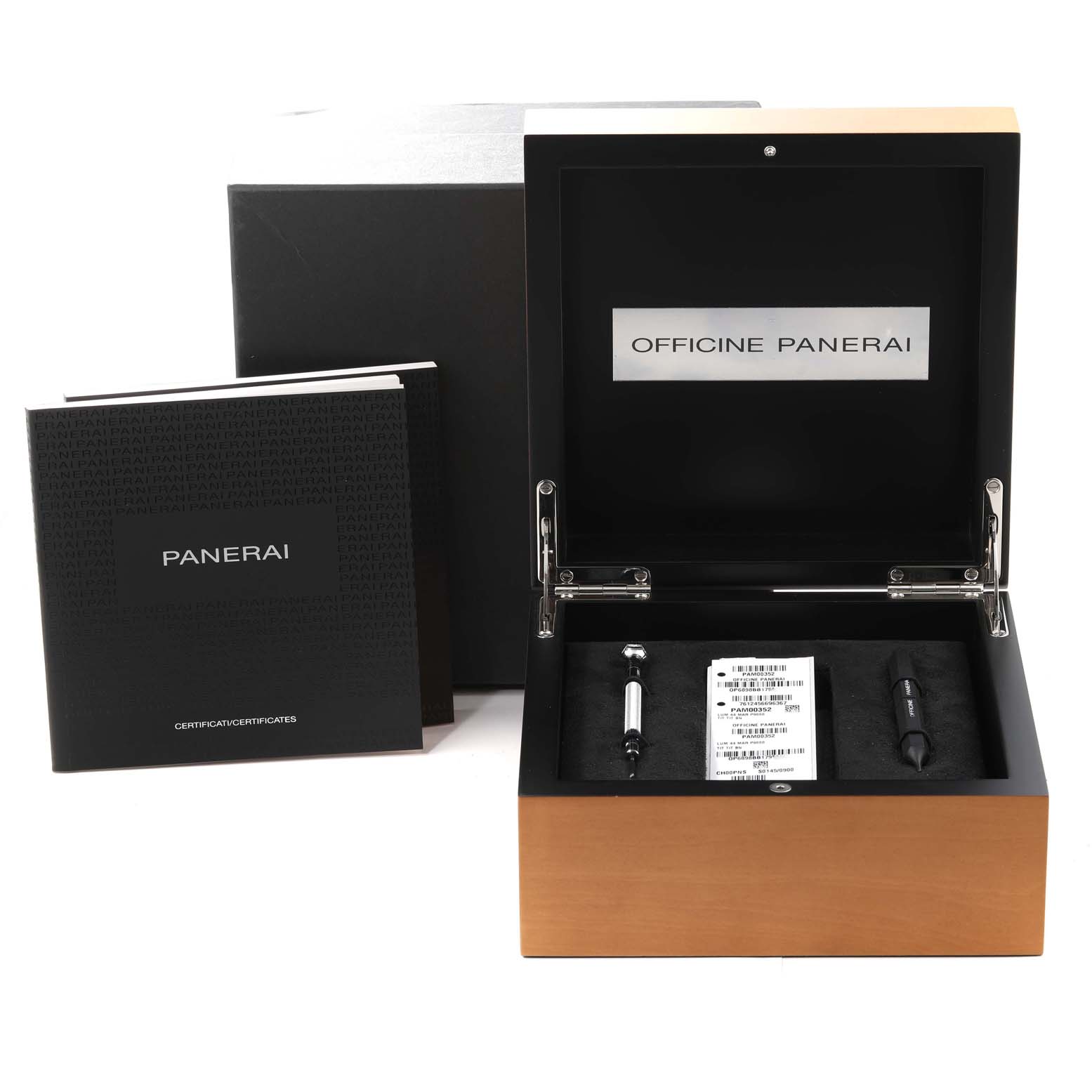 The image shows the open packaging box for a Panerai Luminor PAM00352 Men's Titanium Brown Dial PAM00352 Men's Titanium Brown Dial watch, including tools and documentation.