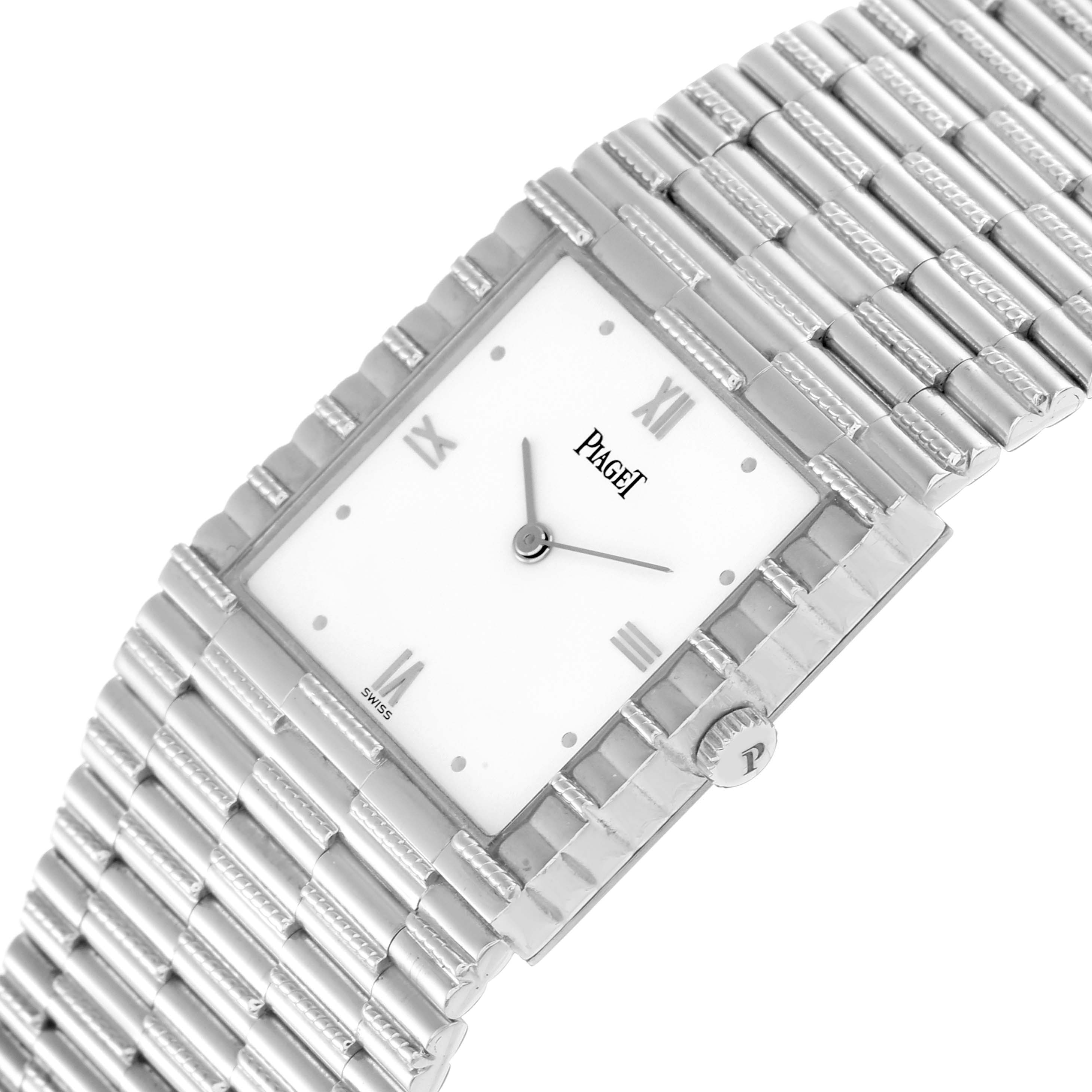 The Piaget 80131G2 Women
s White Gold White Dial 80131G2 Women
s White Gold White Dial 80131 watch is shown at an angled view, highlighting its face, Roman numerals, and the textured white gold bracelet.