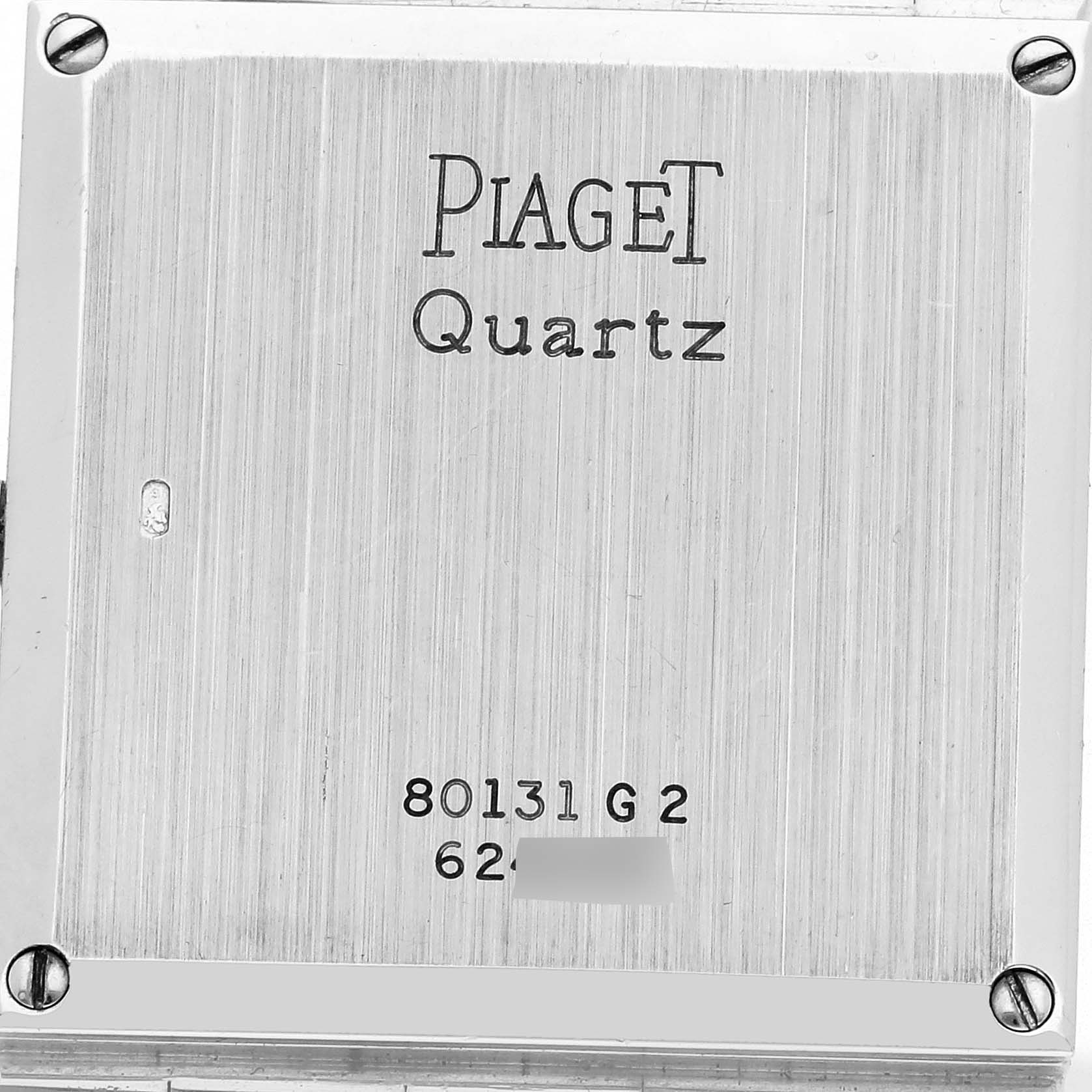 The image shows the back of the Piaget 80131G2 Women
s White Gold White Dial 80131G2 Women
s White Gold White Dial Quartz model 80131 watch, displaying its screws and inscriptions.