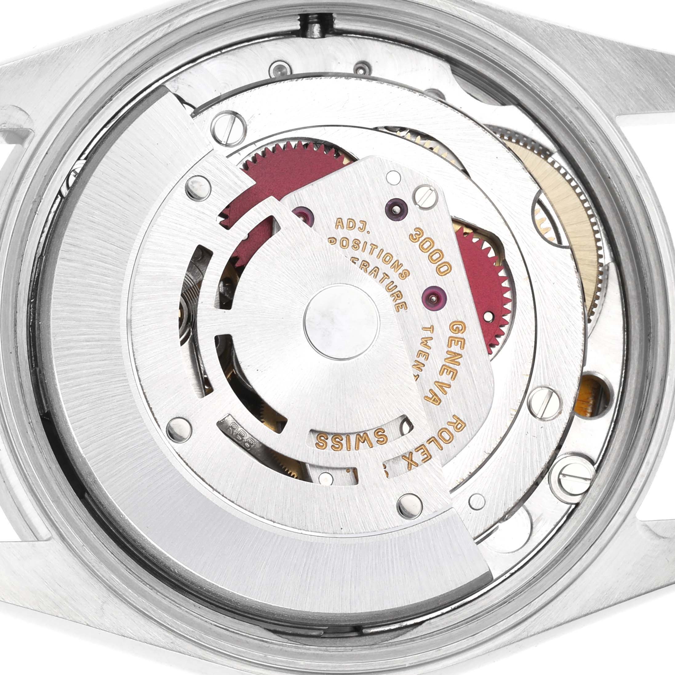 This image shows a close-up of the movement inside a Rolex Air-King 14010 Men's Stainless Steel Blue Dial 14010 Men's Stainless Steel Blue Dial watch from a top-down perspective.