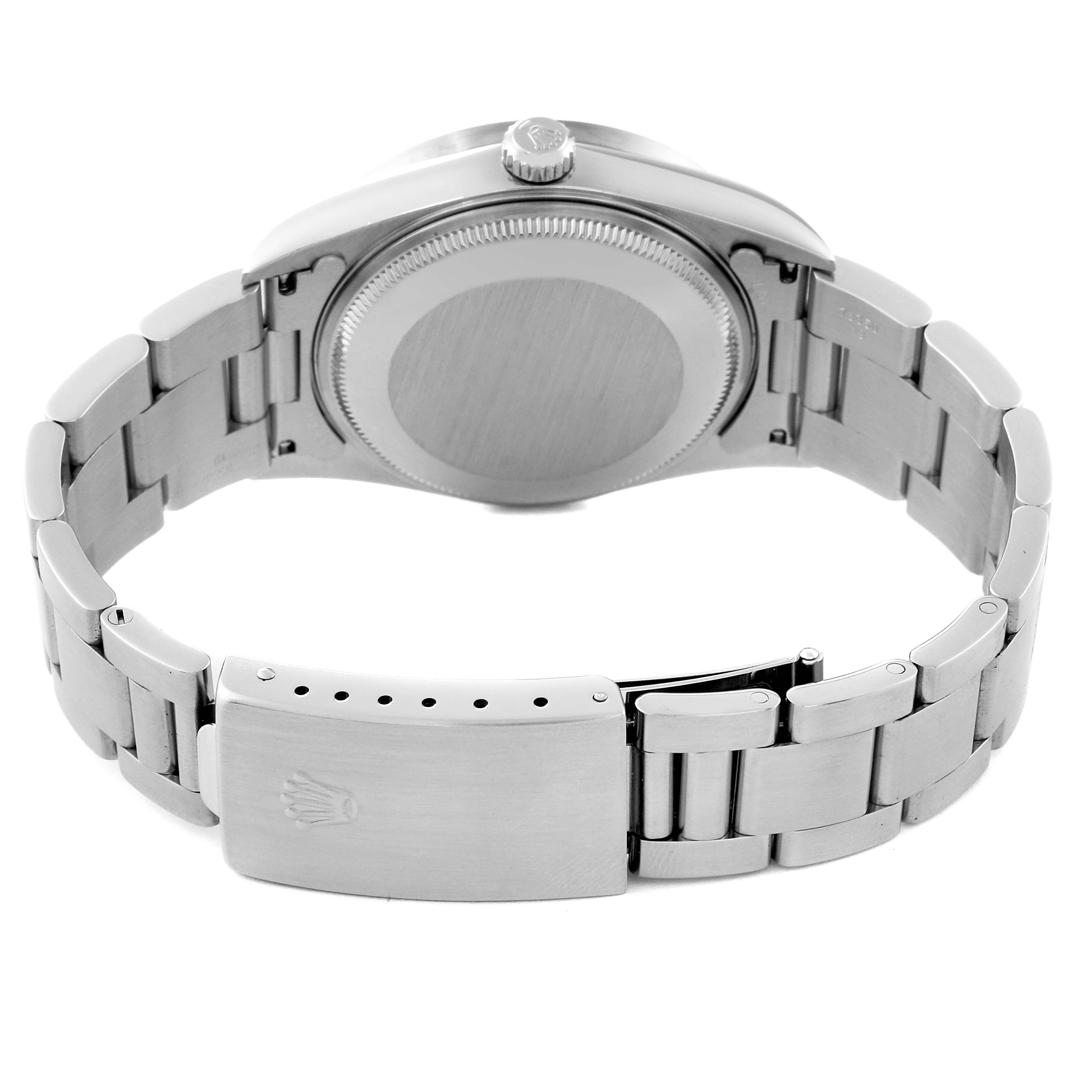 The image shows the backside and clasp of a Rolex Air-King 14010M Men's Stainless Steel Black Dial 14010M Men's Stainless Steel Black Dial watch, highlighting the bracelet and the back case.