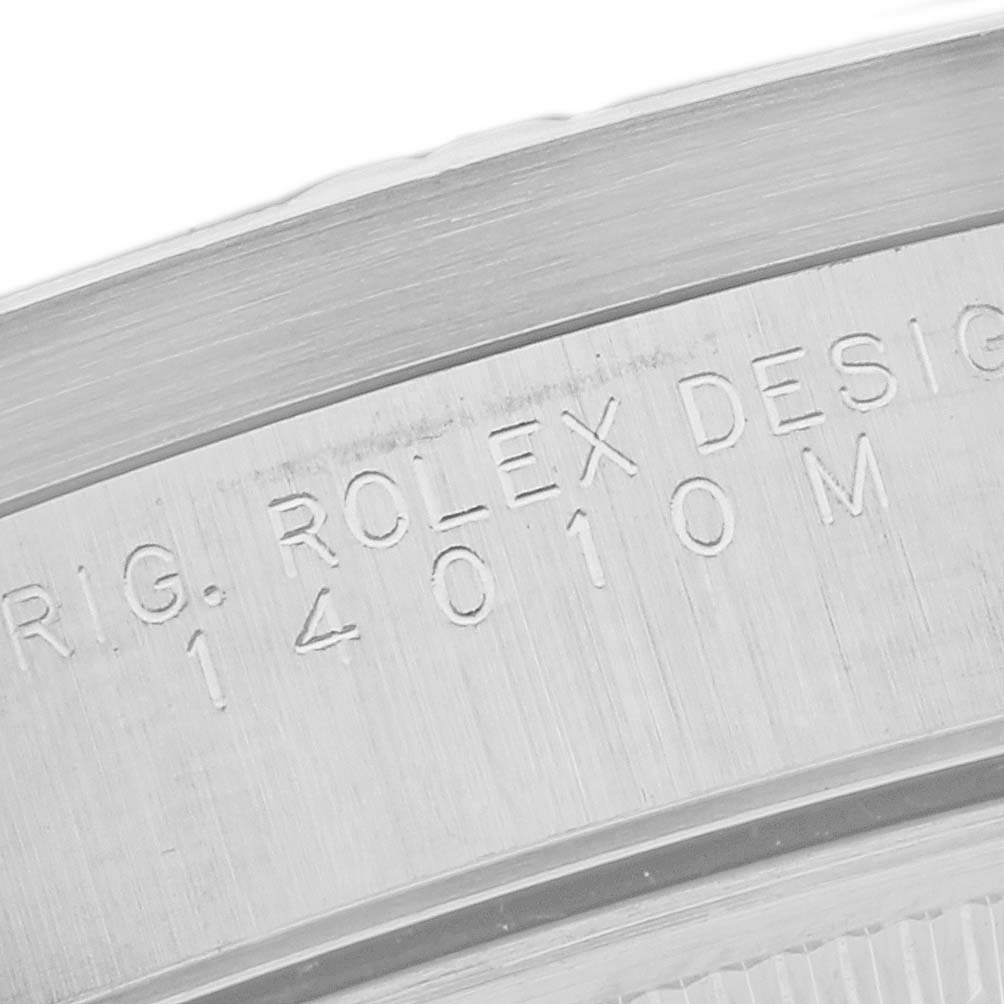 This is a close-up view of the engraving on the case back of a Rolex Air-King 14010M Men's Stainless Steel Black Dial 14010M Men's Stainless Steel Black Dial watch.