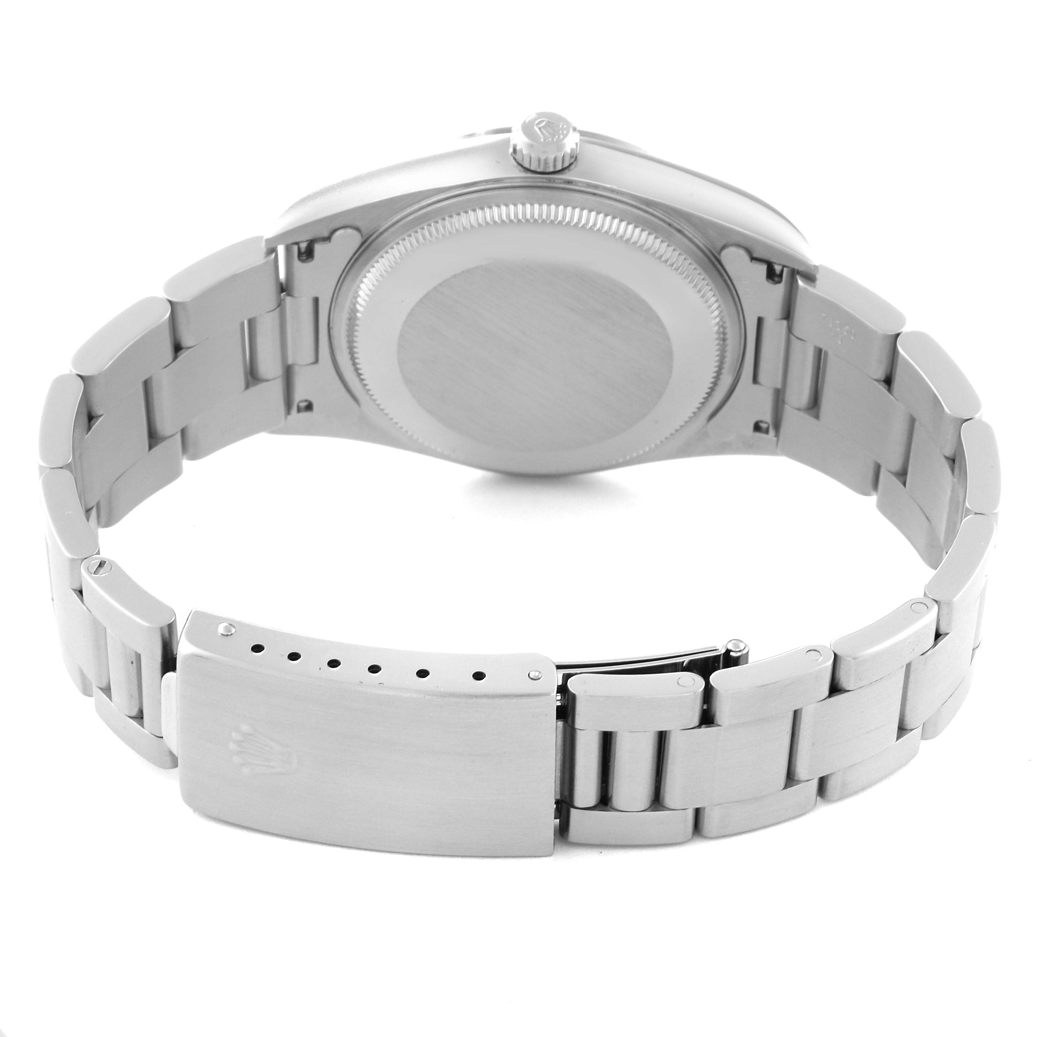 The image shows the backside of a Rolex Air-King 14000M Men's Stainless Steel Pink Dial 14000M Men's Stainless Steel Pink Dial watch, focusing on the bracelet, clasp, and case back.