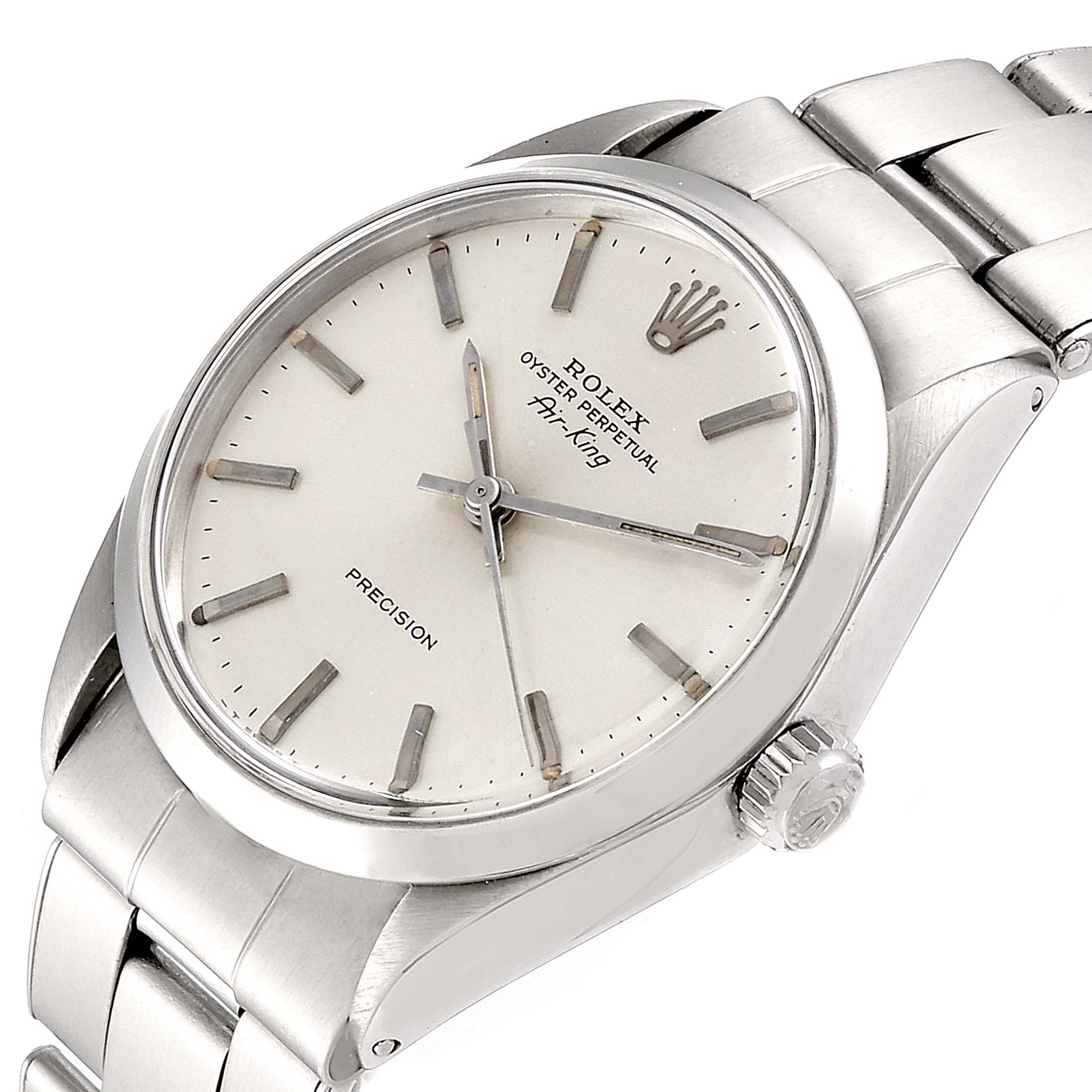 The image shows a Rolex Vintage Collection 5500 Men
s Stainless Steel Silver Dial 5500 Men
s Stainless Steel Silver Dial Air-King watch at a slight angle, highlighting its dial, crown, and bracelet.