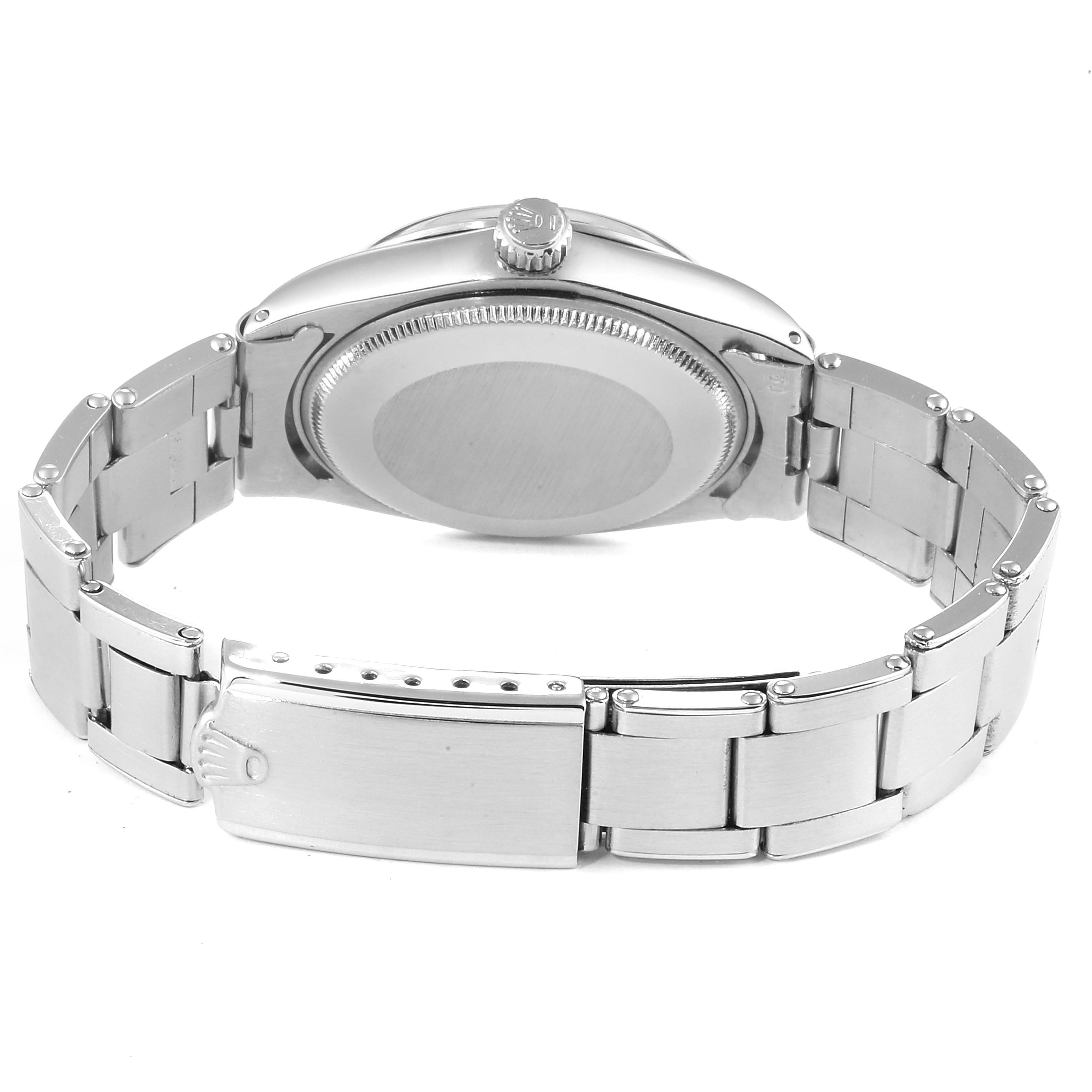 This image shows the back case and bracelet clasp of the Vintage Collection model by Rolex, viewed from the rear.