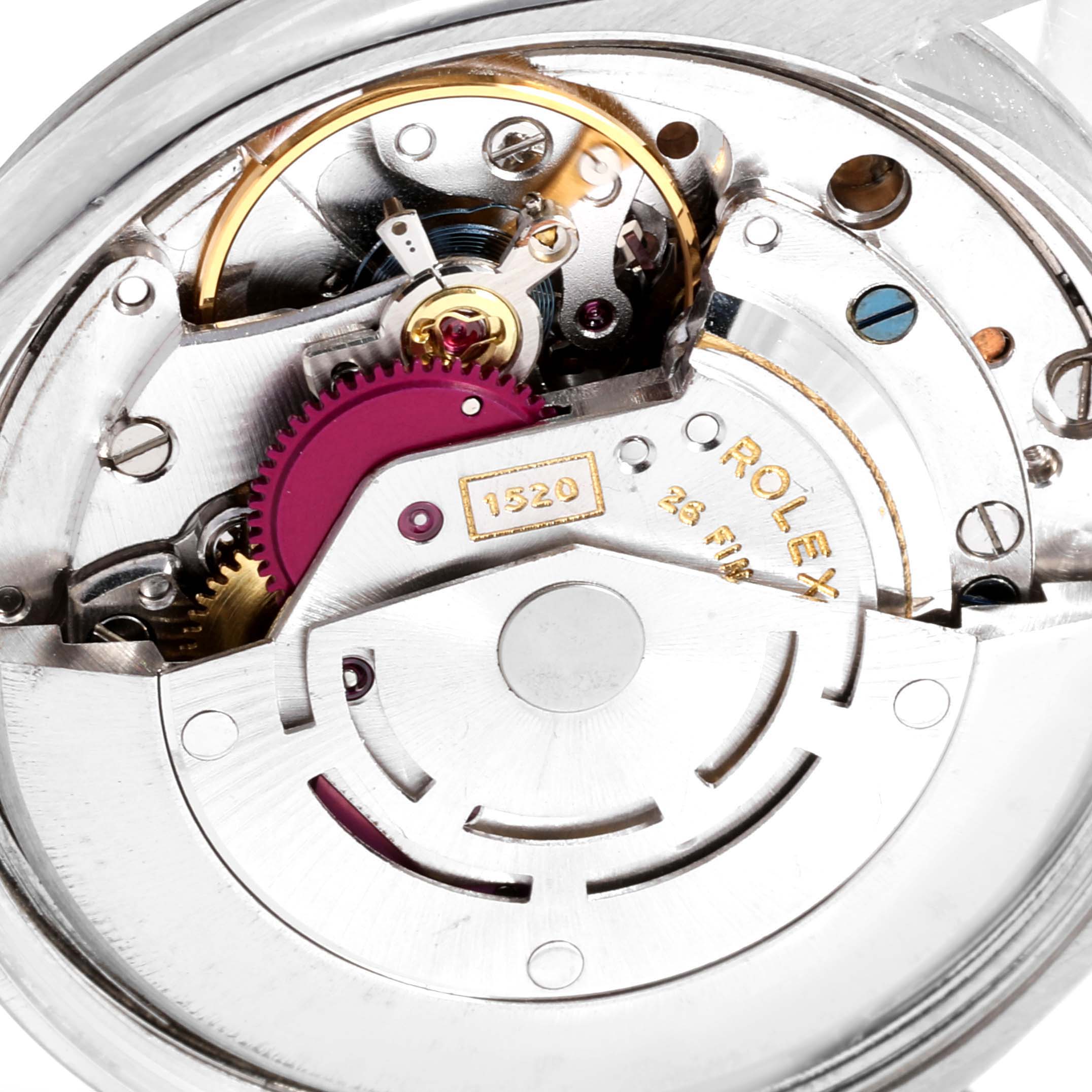 This image shows the internal mechanism with gears of a Vintage Collection Rolex watch.