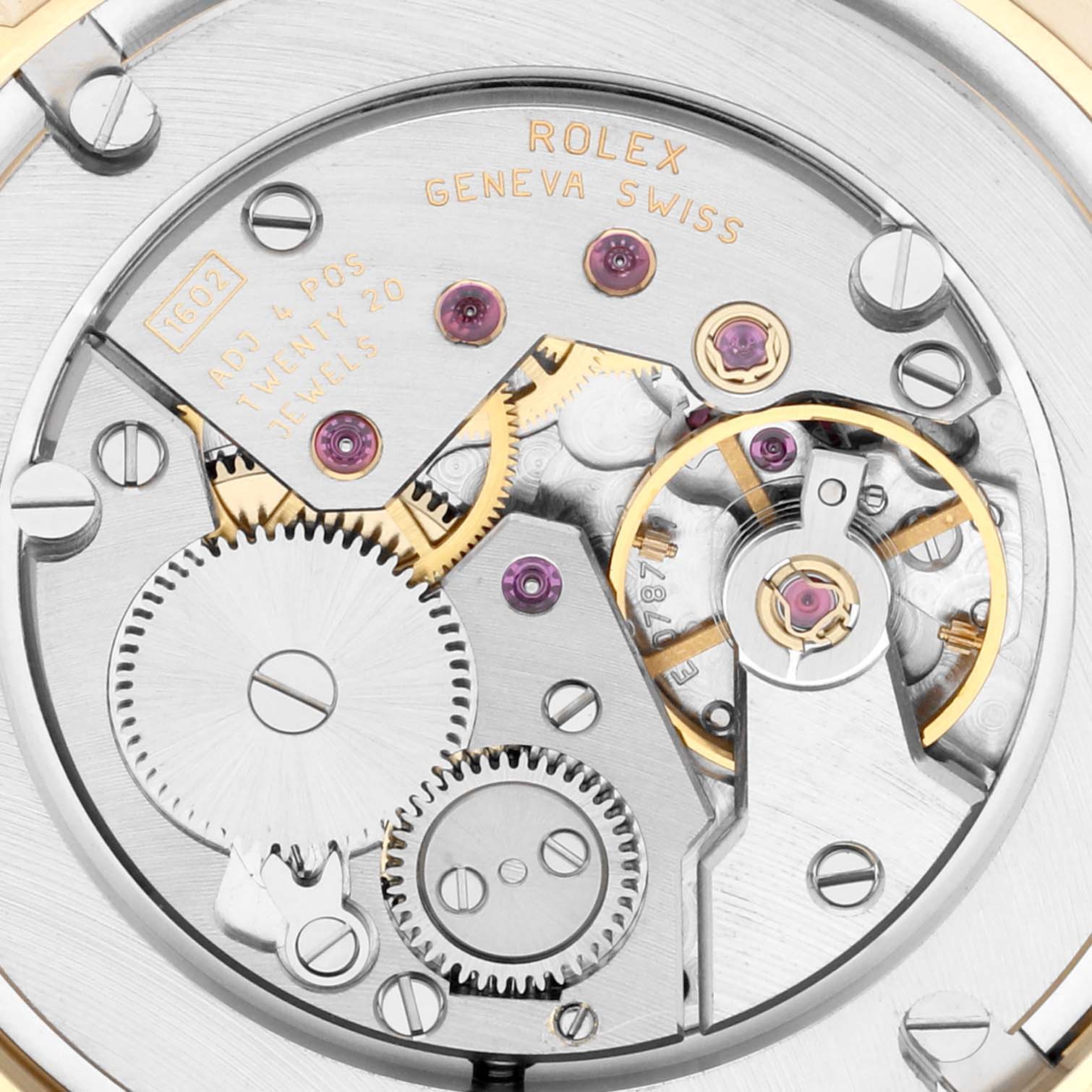 This is an up-close view of the Rolex Cellini 5115 Men's Yellow Gold Grey Dial 5115 Men's Yellow Gold Grey Dial watch movement, showcasing its gears and mechanical components.