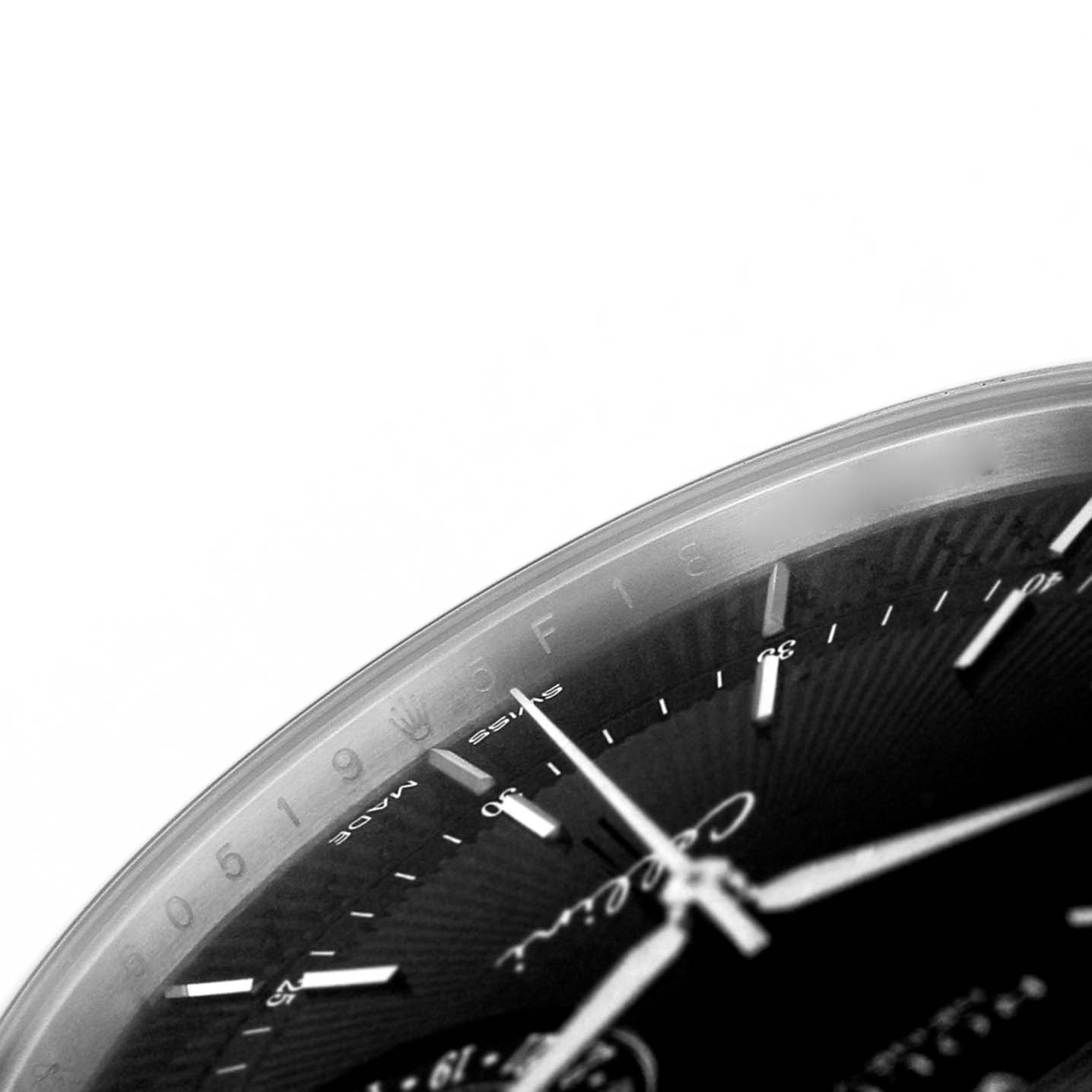 The image shows a close-up of the dial and bezel of a Rolex Cellini 50519 Men's White Gold Black Dial watch from a side angle.