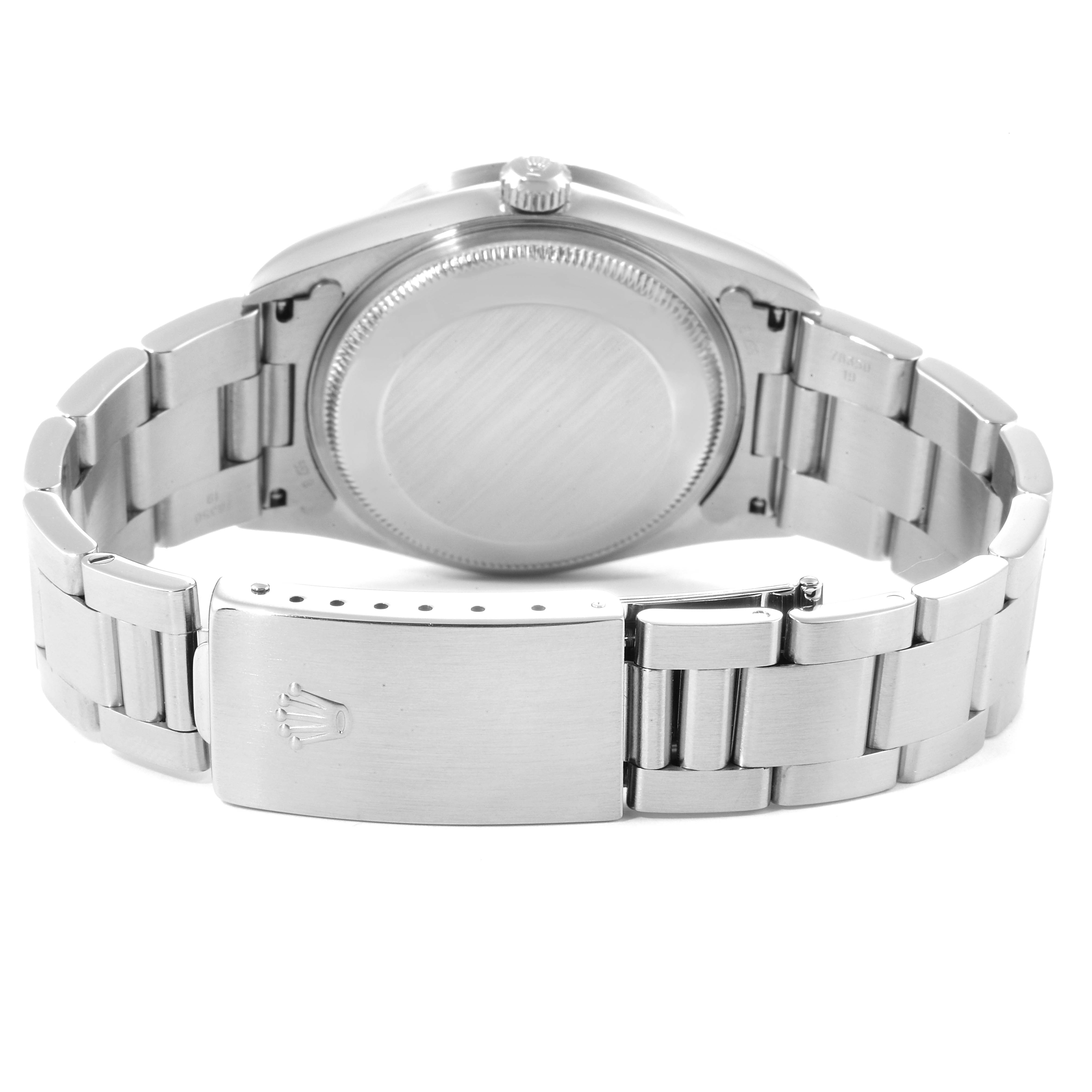 The image shows the back view of a Rolex Date 15210 Men's Stainless Steel Blue Dial 15210 Men's Stainless Steel Blue Dial model watch, highlighting its bracelet and closed clasp.