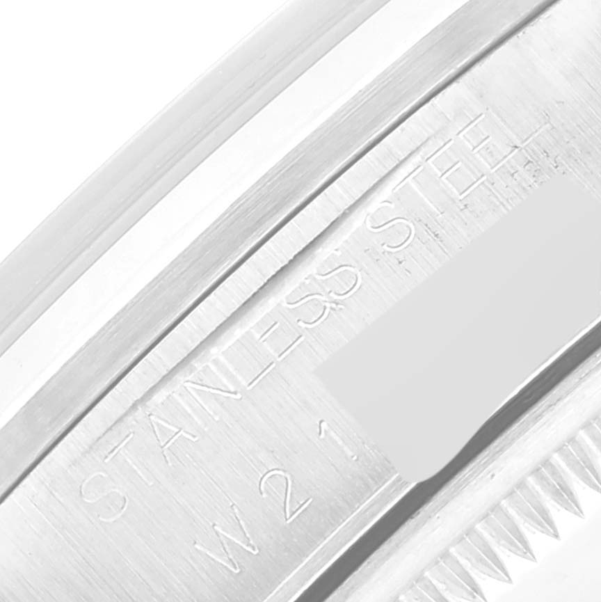 This image shows a close-up angle of the stainless steel case and serial number area of a Rolex Date 15200 Men's Stainless Steel White Dial 15200 Men's Stainless Steel White Dial model watch.