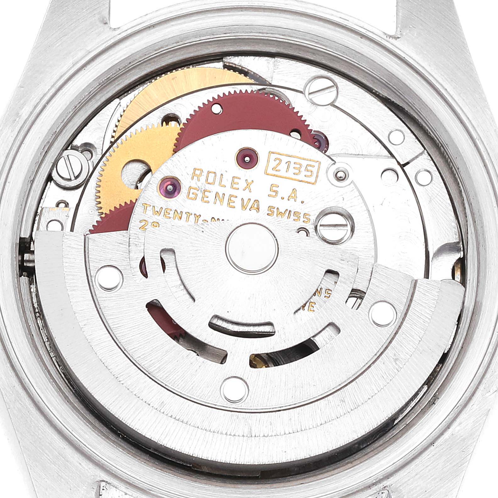 The image shows an intricate view of the movement and internal components of a Rolex Date 69160 Women
s Stainless Steel Silver Dial 69160 Women
s Stainless Steel Silver Dial model watch.