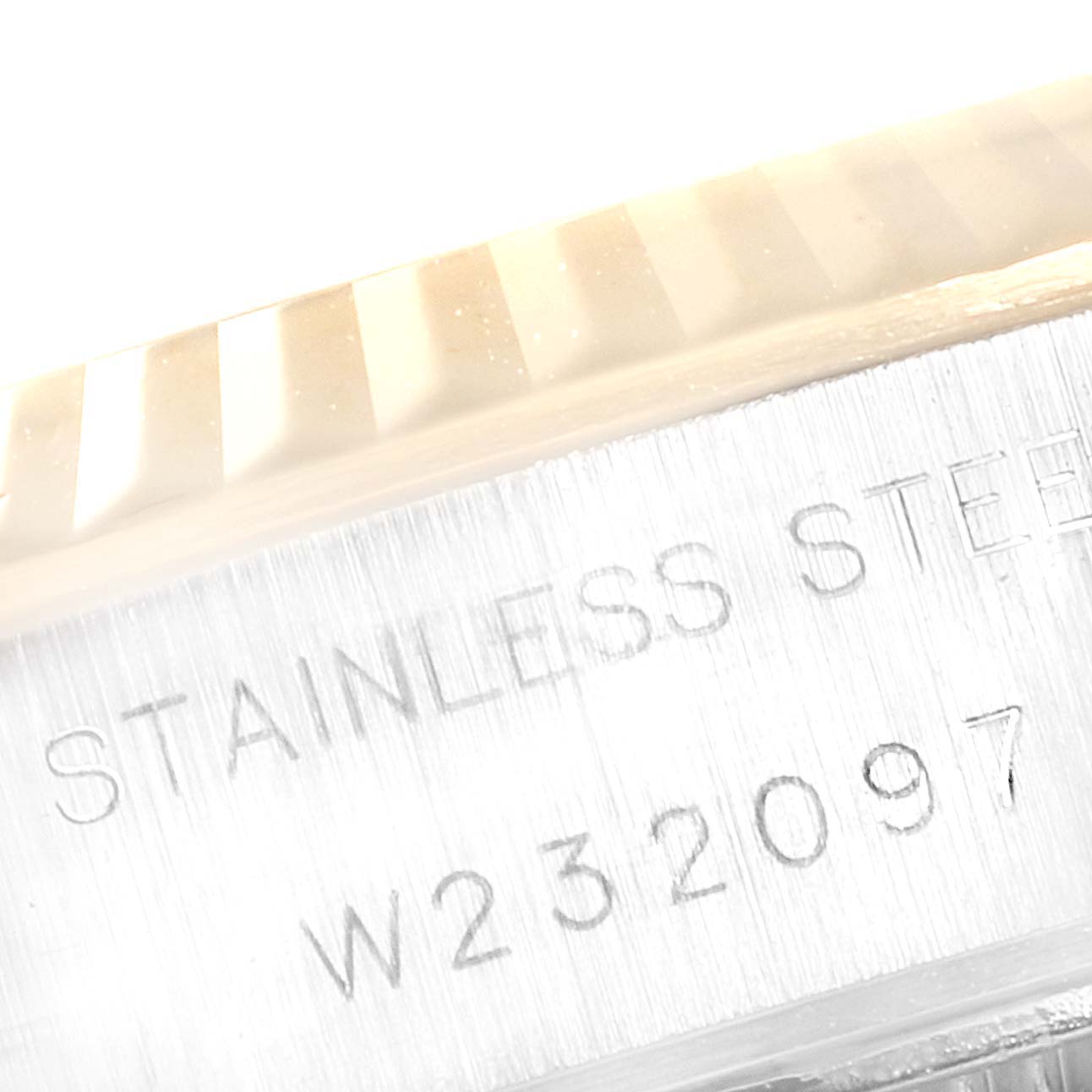 The image shows the stainless steel case with serial number of a Rolex Datejust 69173 Women
s Steel and Gold (two tone) Champagne Dial 69173 Women
s Steel and Gold (two tone) Champagne Dial watch.