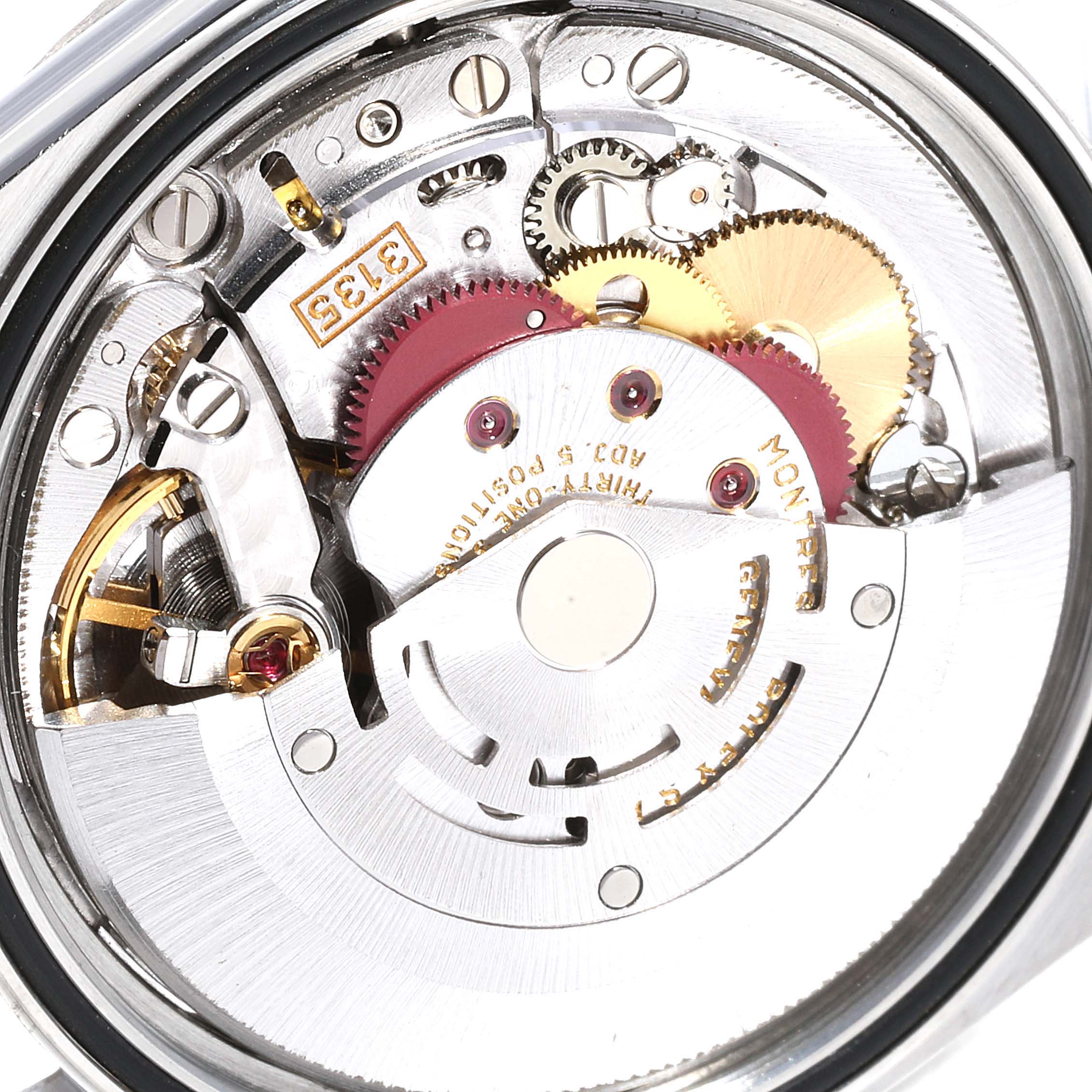 This image shows a close-up view of the intricate internal mechanism of a Rolex Datejust 16234 Men's Stainless Steel Black Dial 16234 Men's Stainless Steel Black Dial model watch.