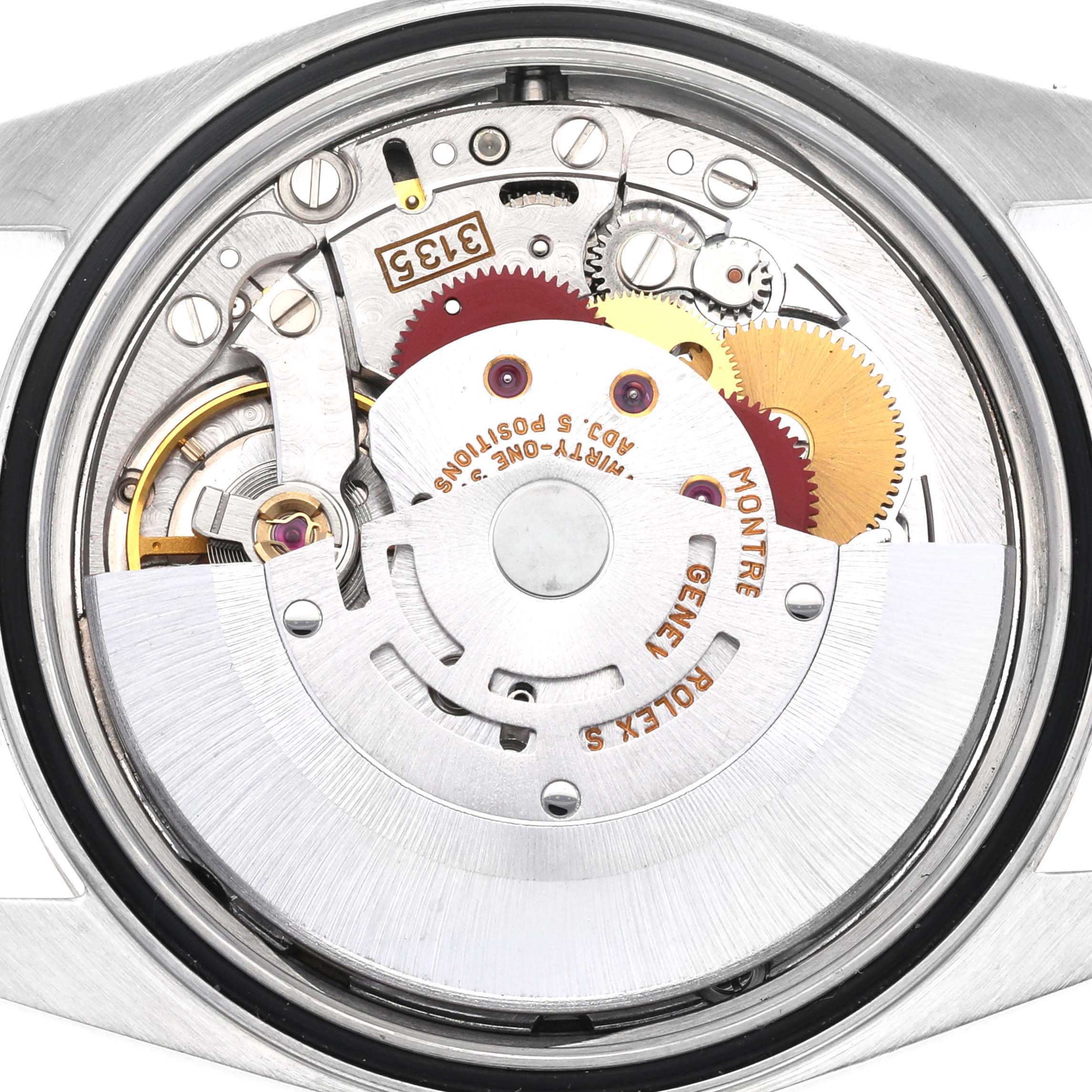 This image shows the movement and internal mechanism of a Rolex Datejust 16233 Men's Steel and Gold (two tone) Black Dial 16233 Men's Steel and Gold (two tone) Black Dial watch viewed from the back.